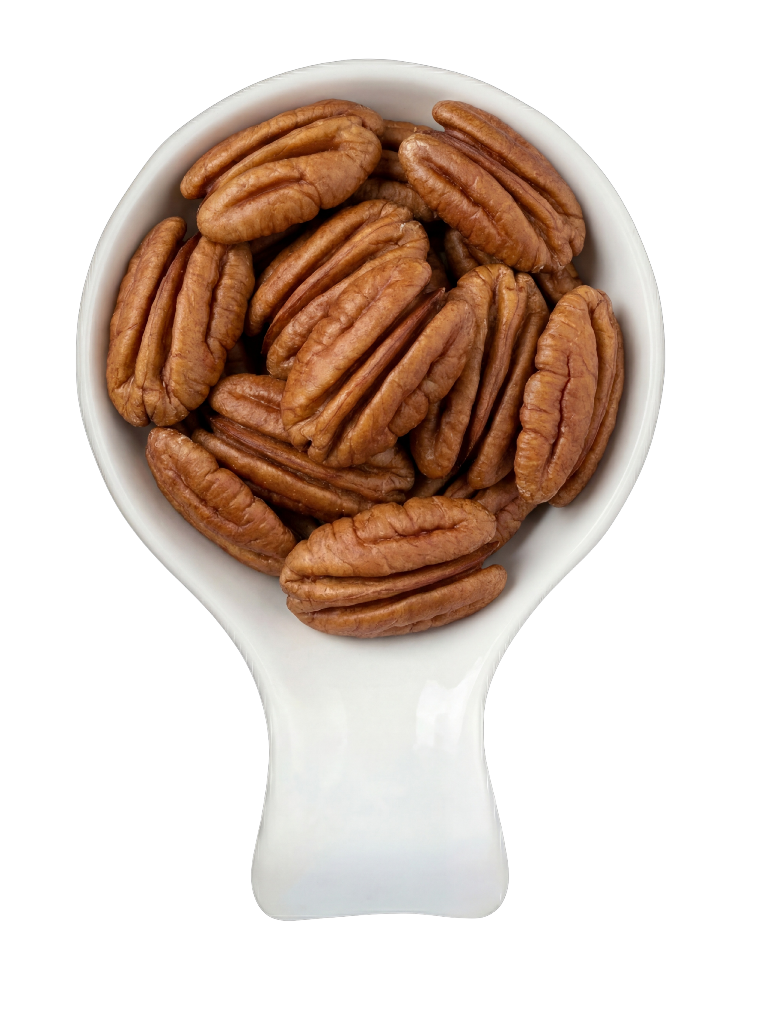 A white spoon filled with roasted pecans against a black background.