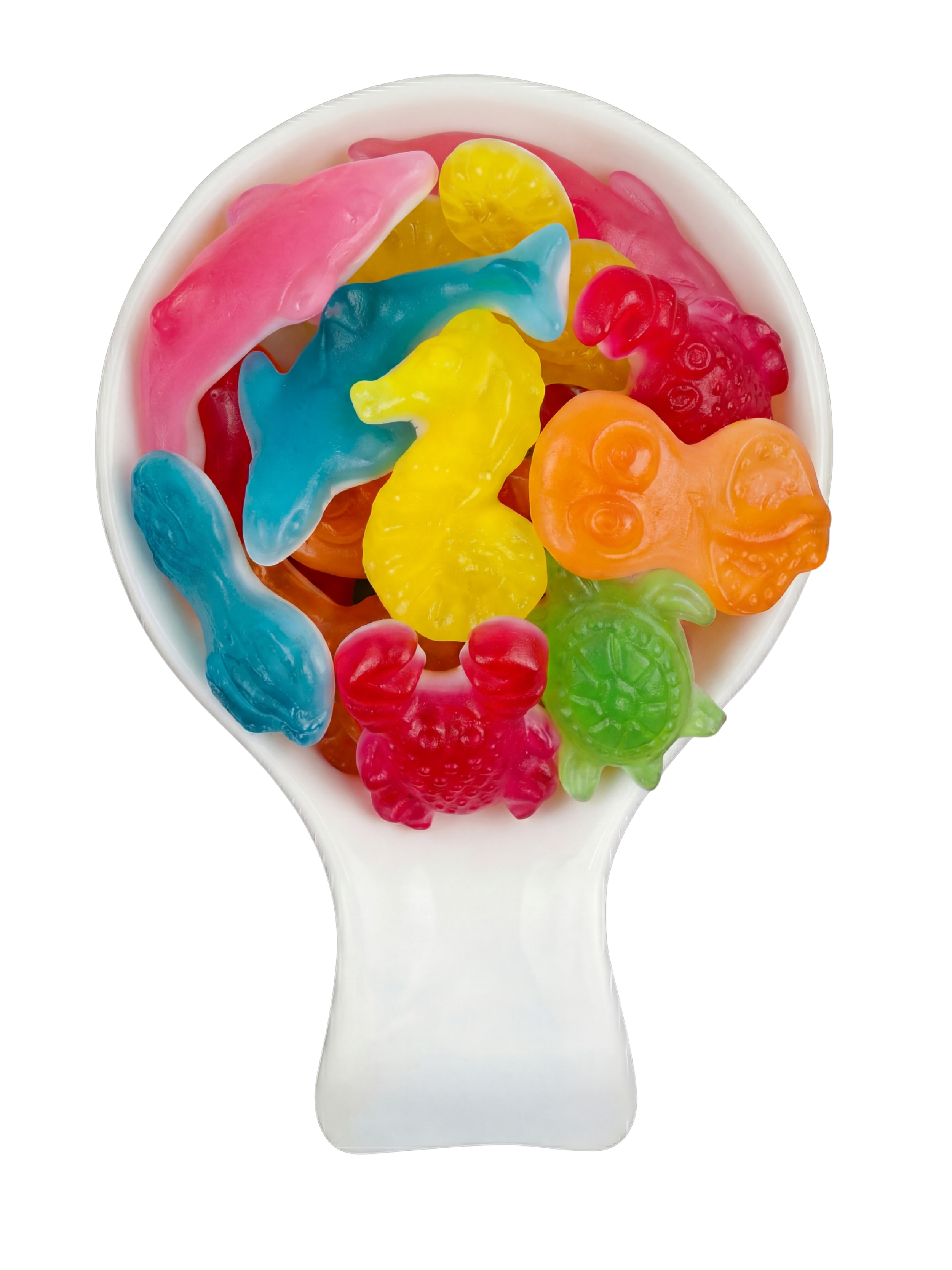 A white plastic spoon filled with colorful gummy candies shaped like various animals and objects, including a blue dolphin, yellow duck, orange turtle, dinosaur, and fish, against a black background.