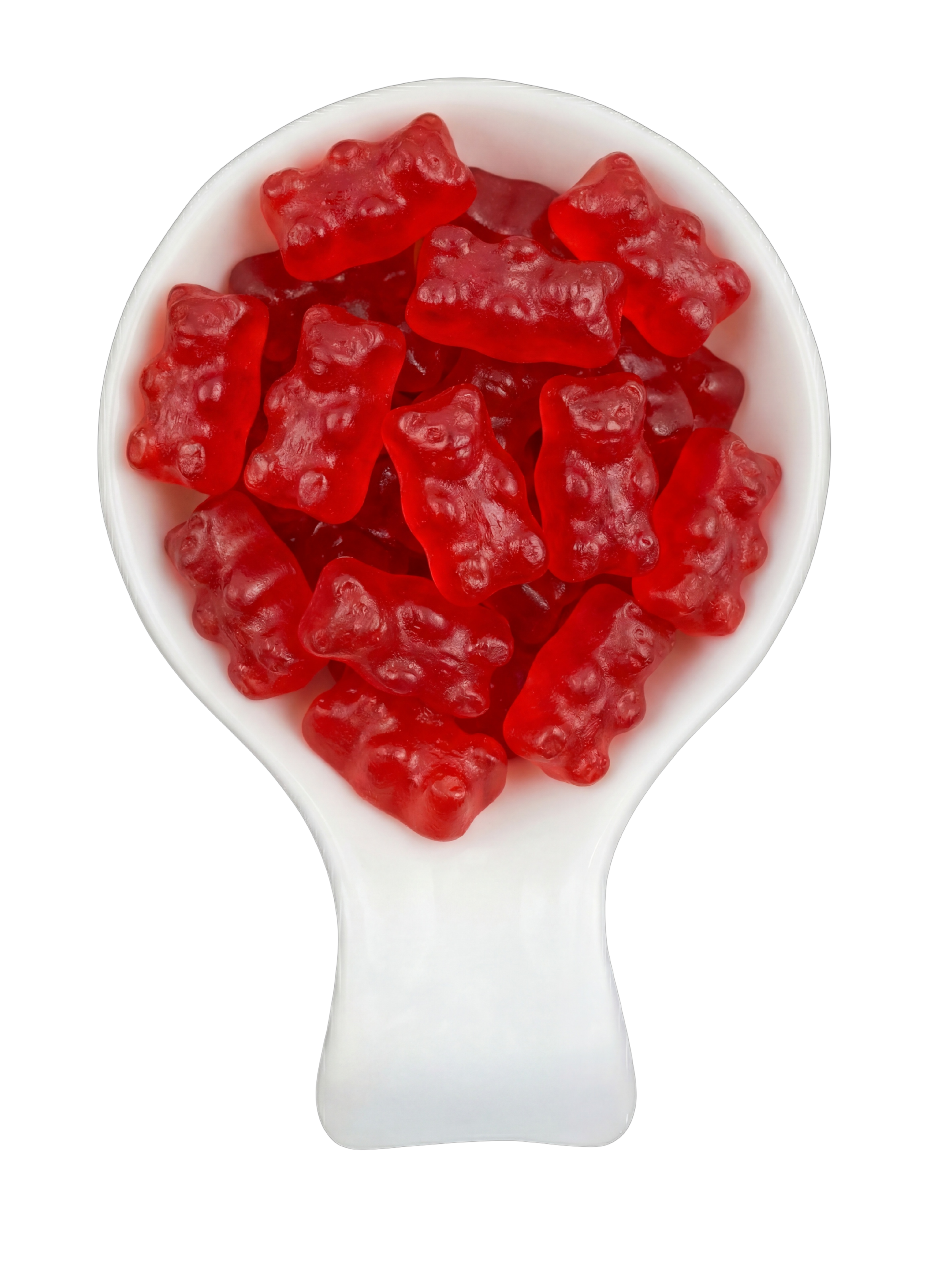 Close-up of a white spoon filled with gummy bear candies against a black background.