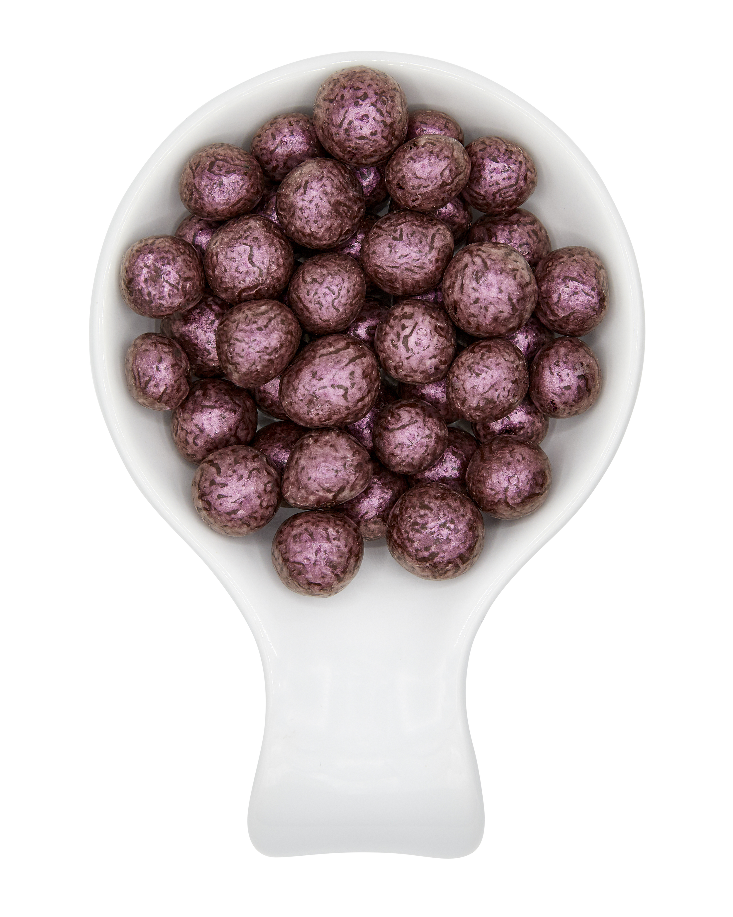 A white scoop filled with purple, round, variegated berries.