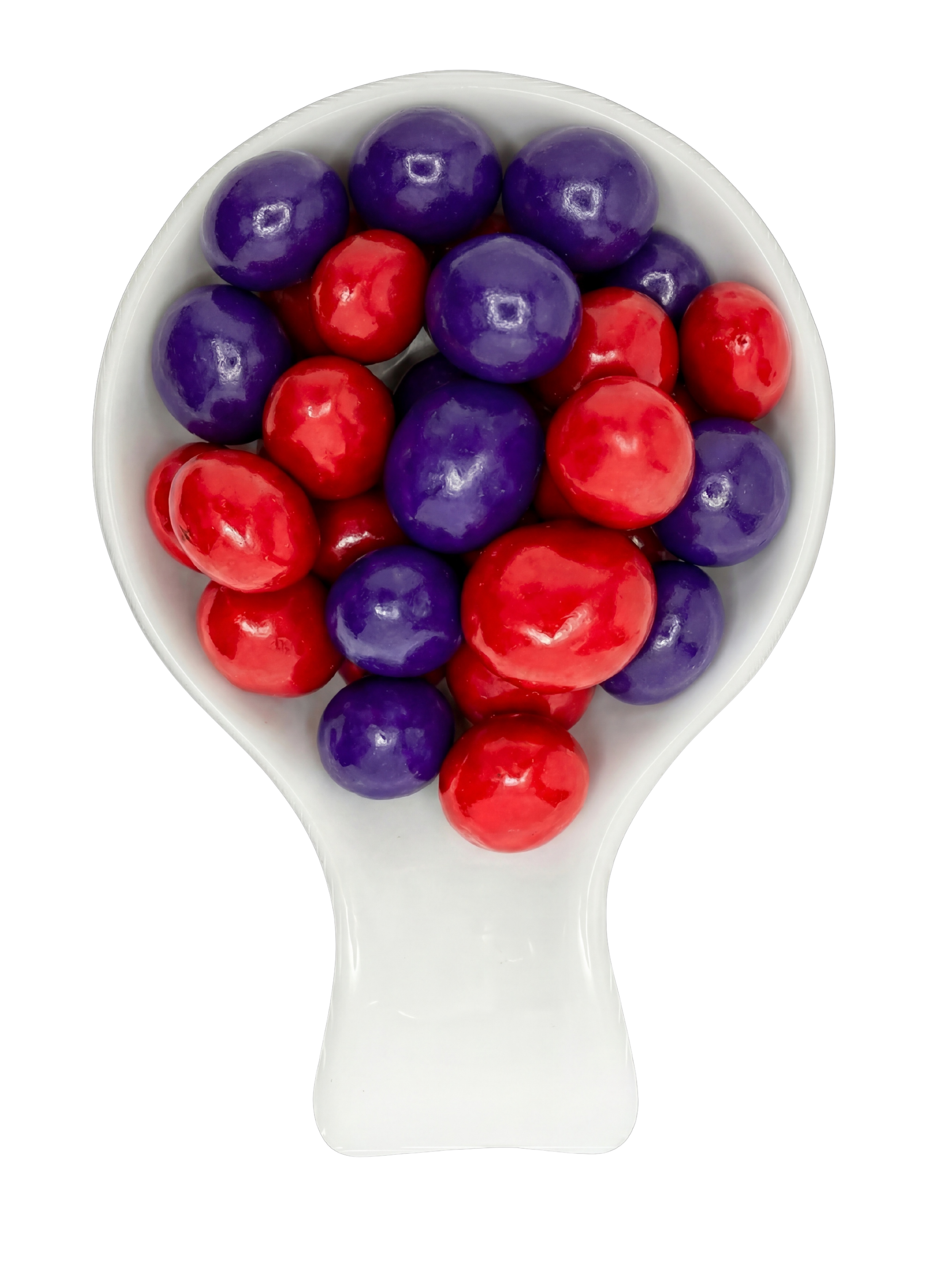 A white spoon filled with red and purple gumballs against a black background.