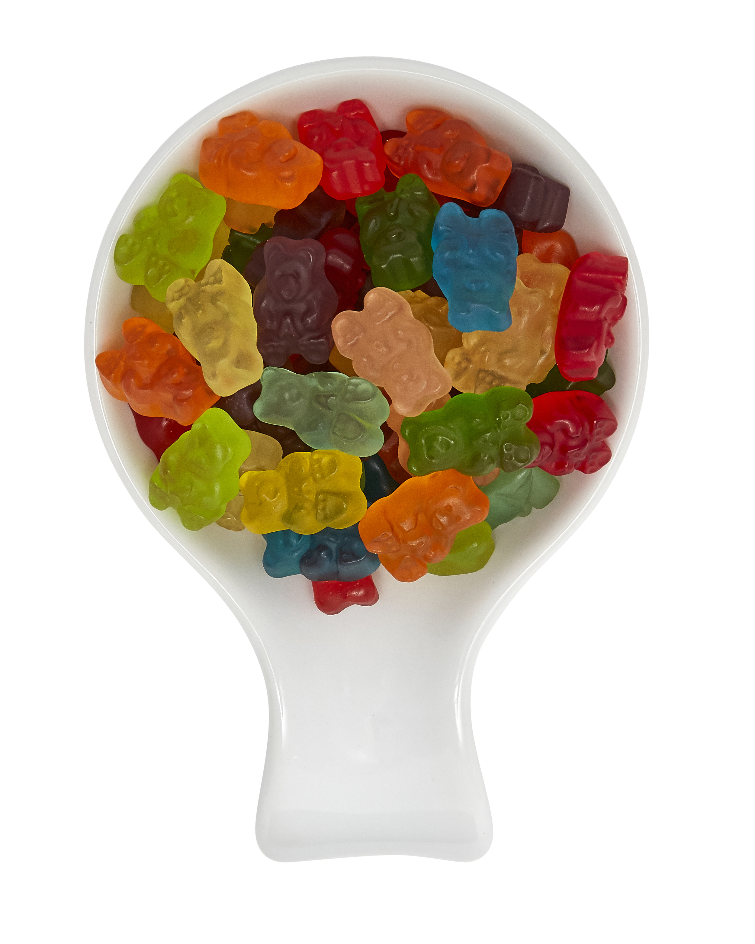Colorful gummy bears in a white spoon on black background.