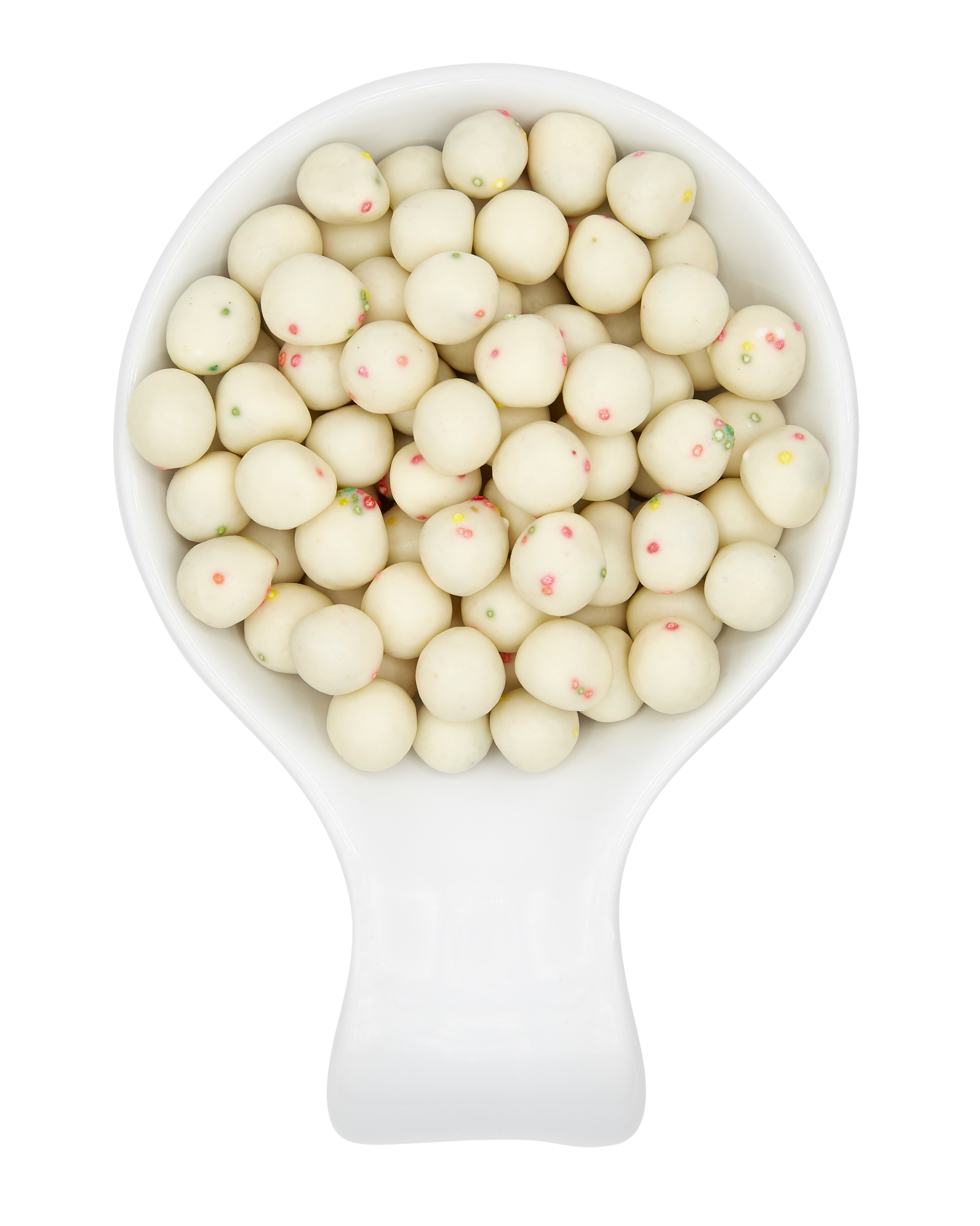A white scoop filled with white candy-coated almonds with tiny colorful sugar sprinkles, against a partially black and gray background.