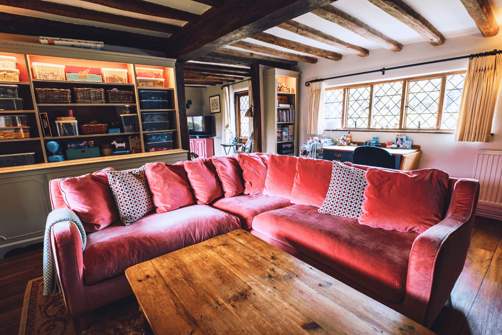 Cosy living room with exposed beams at High Birch.