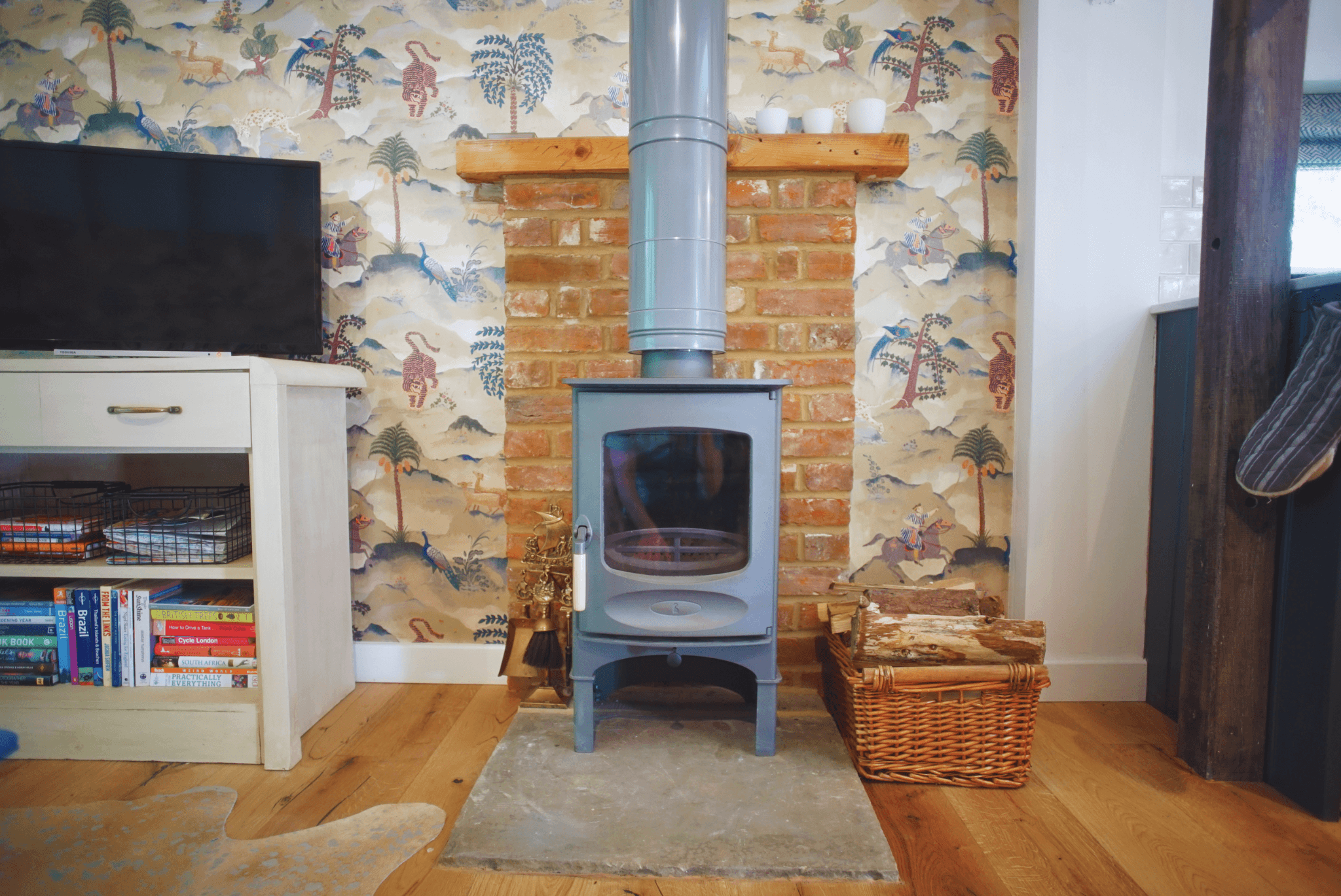 Wood-burning stove and rustic interiors at The Snuggery.