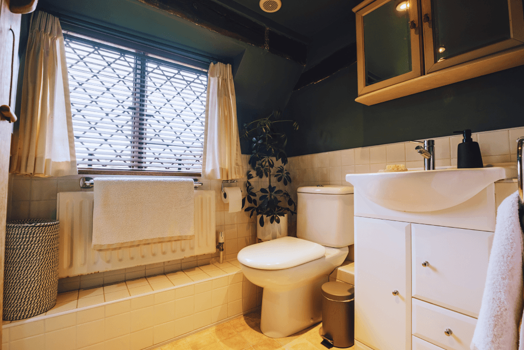 Cottage bathroom with rustic interiors at High Birch.