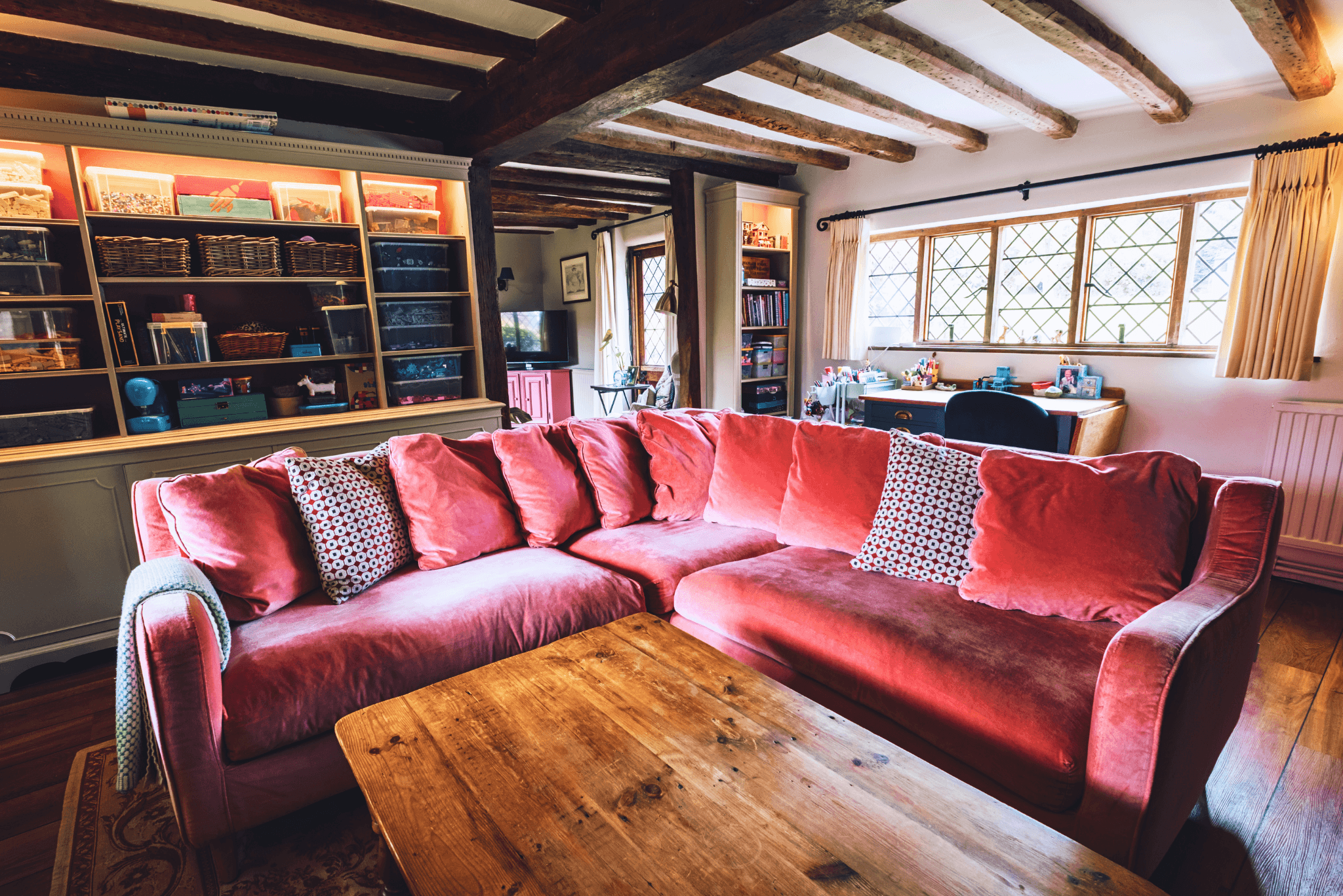 Cosy living room with exposed beams at High Birch.