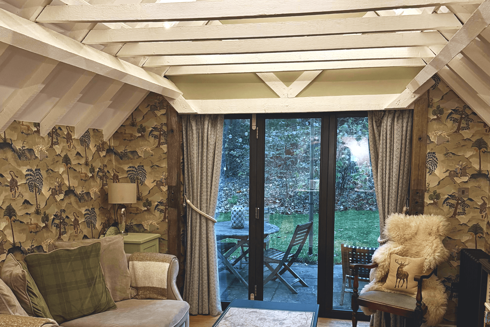 Cosy countryside living room with garden views.