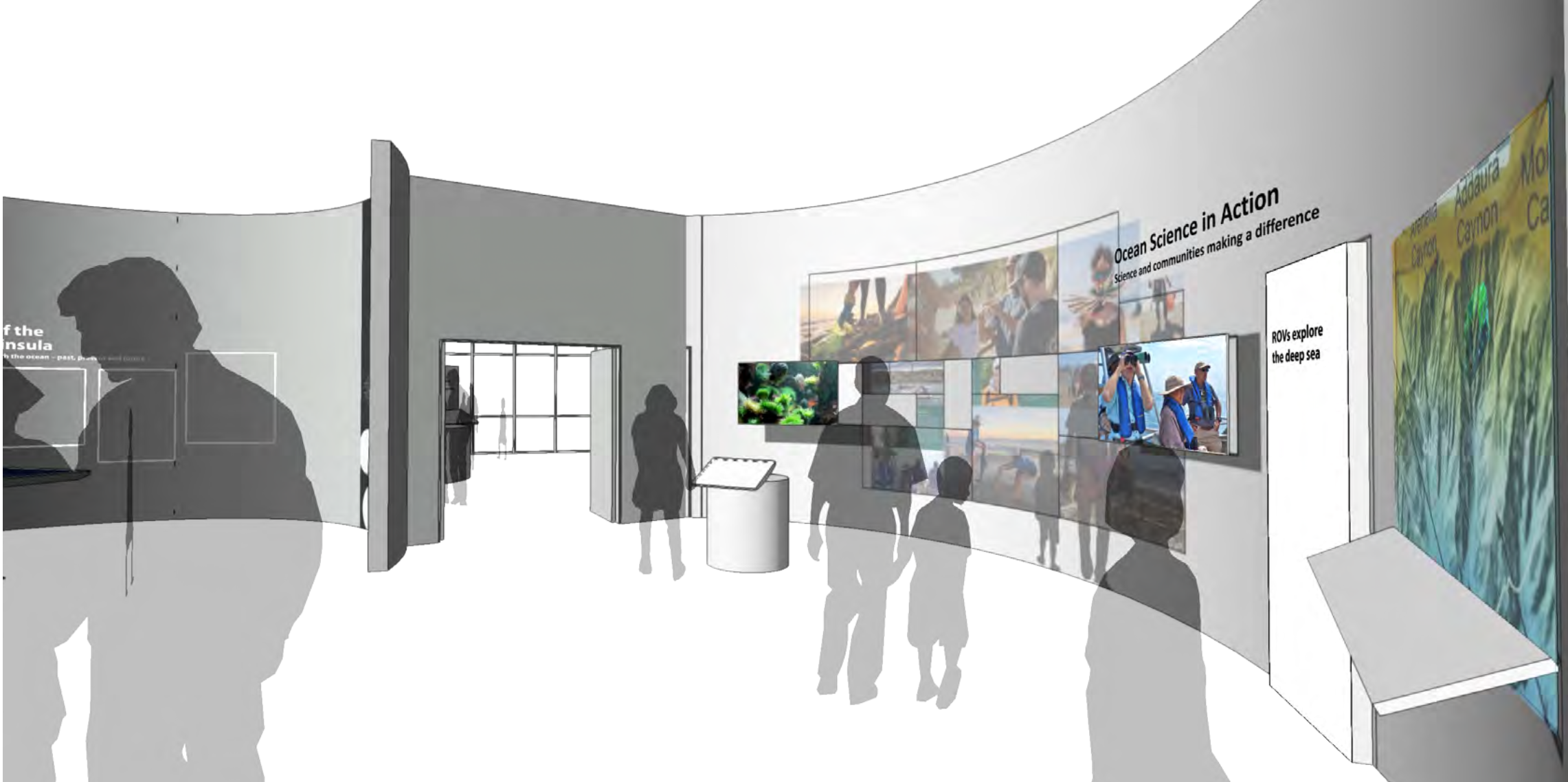 Exhibit space featuring informational displays and videos related to ocean science, with a focus on deep sea exploration and community impact.