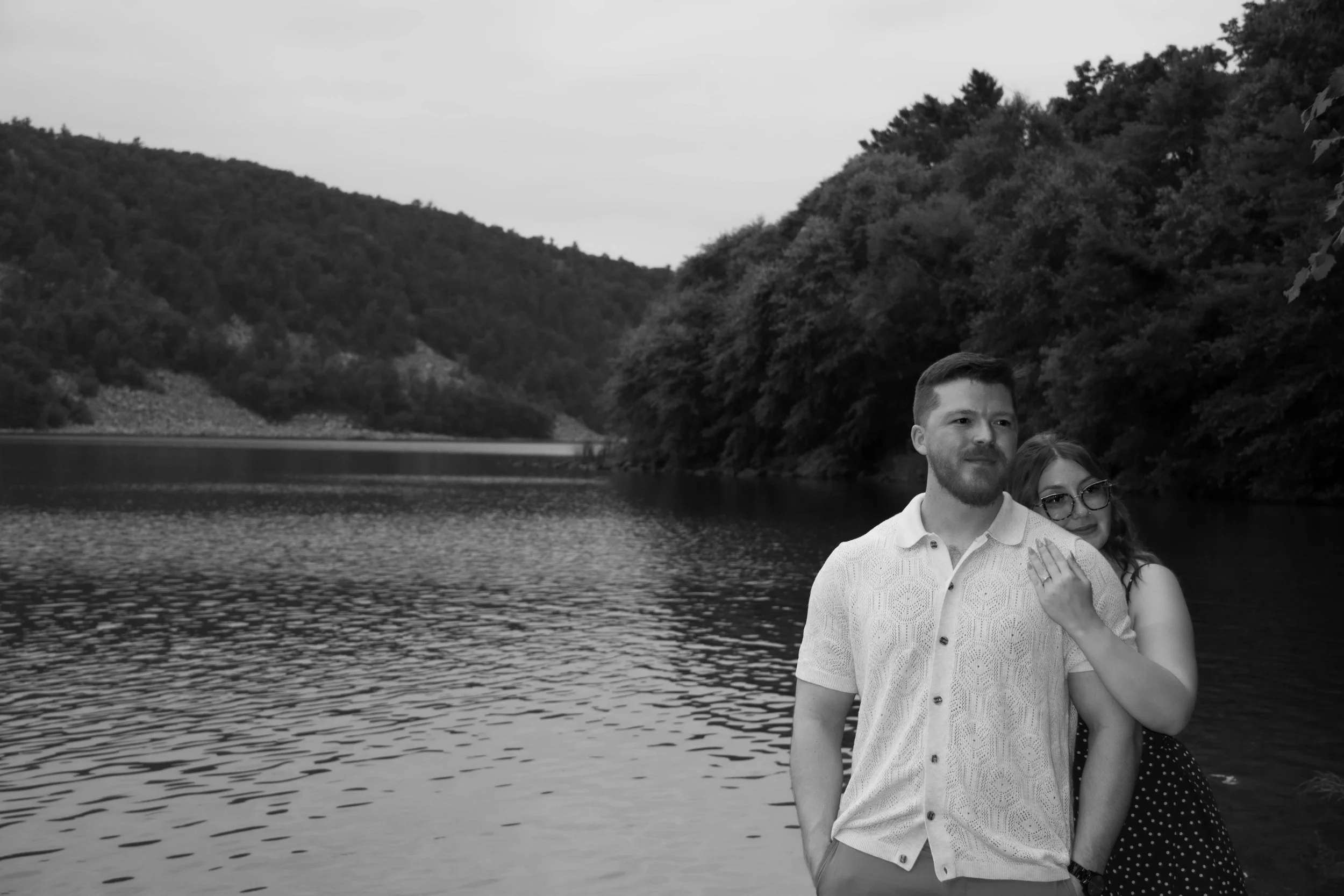 Newly engaged couple using a moments collection
