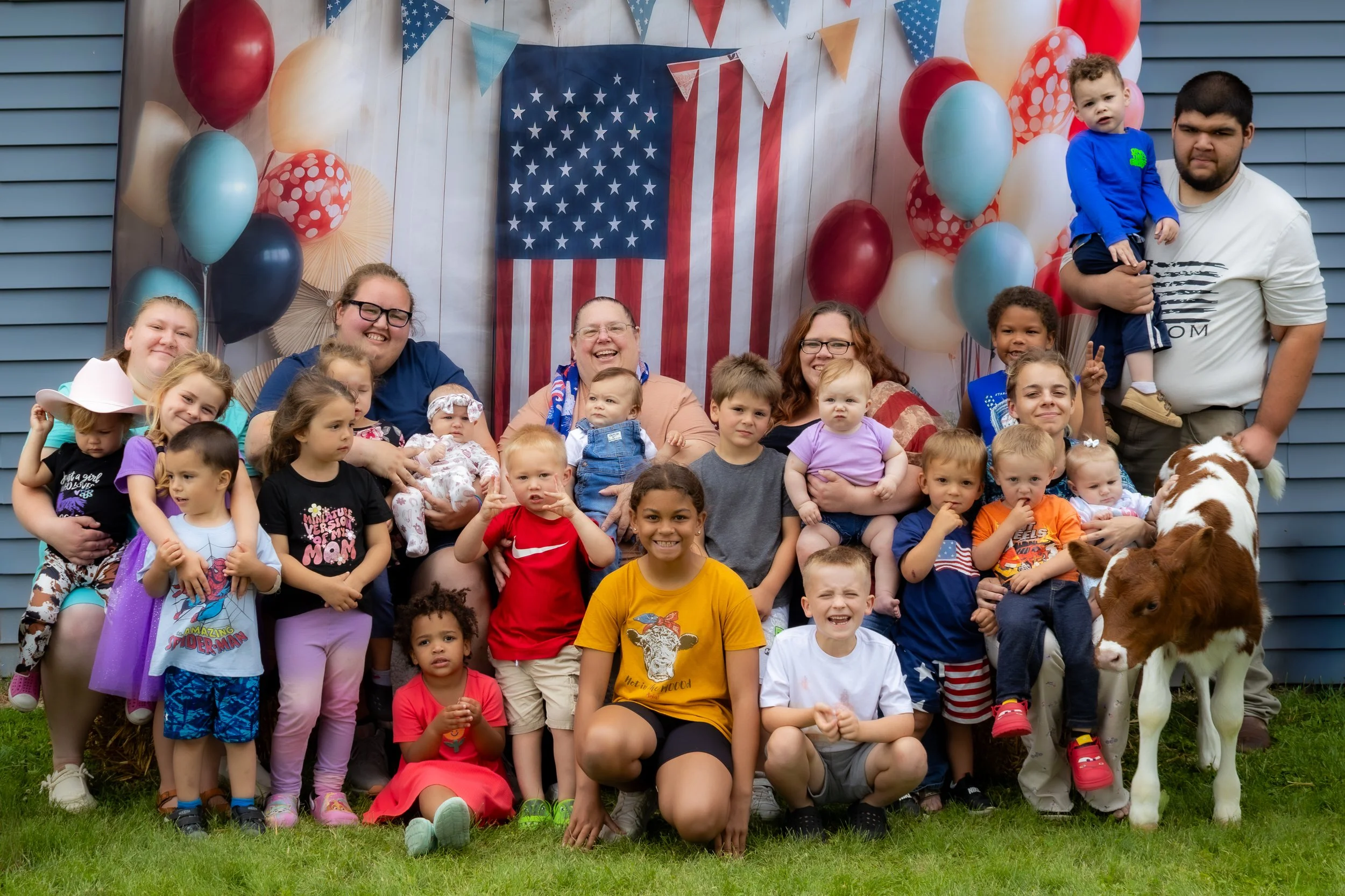 Whole group photo for school day smiles at a childcare center