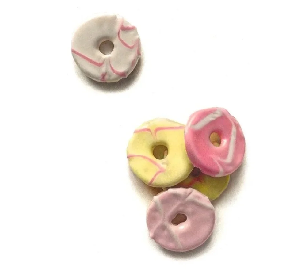 Hyperrealism coloured pencil drawing of Party Rings biscuits, by Connor Hornby