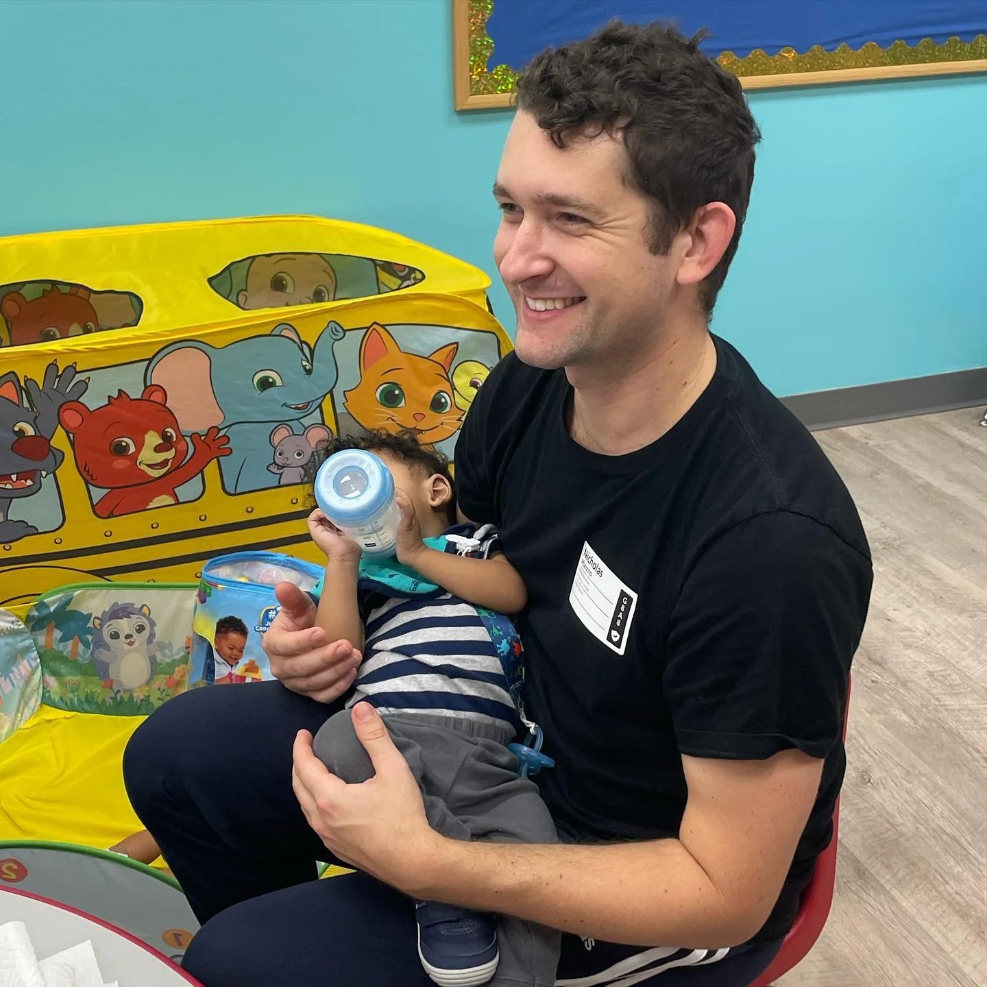 fofc-volunteer-feeding-baby.jpg