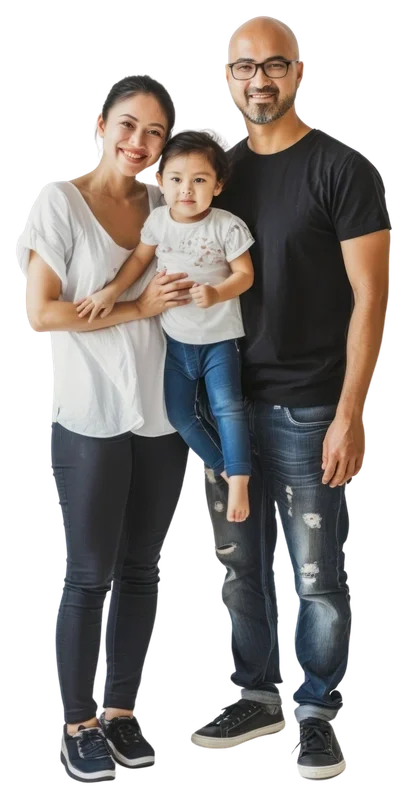 Happy family of three standing together, including a woman, a man, and a young girl they are holding.