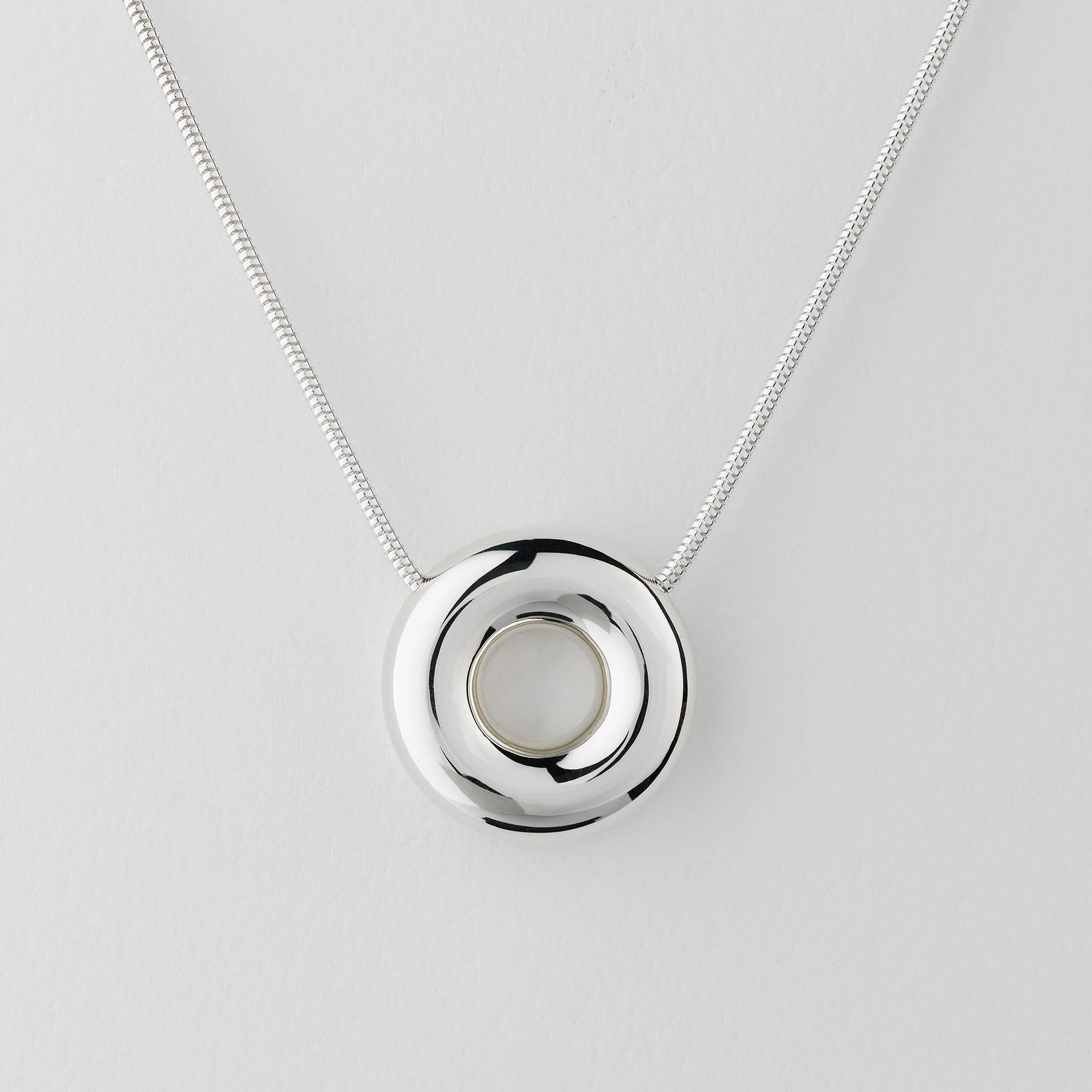 Sterling silver Monad statement necklace, large polished circular torus pendant on snake chain