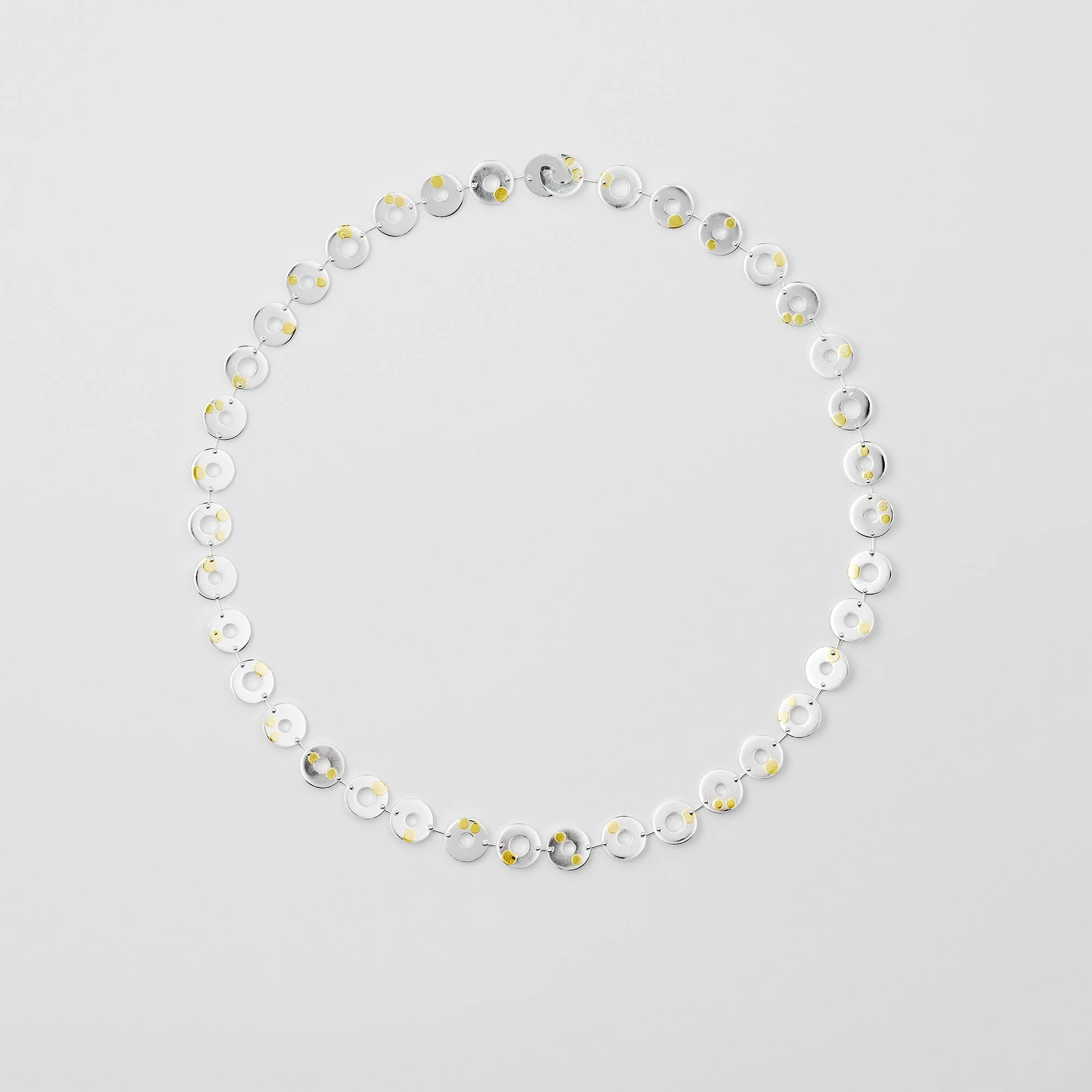 Sterling silver Kairoi necklace, linked flat torus chain with 24ct gold dotted detailing
