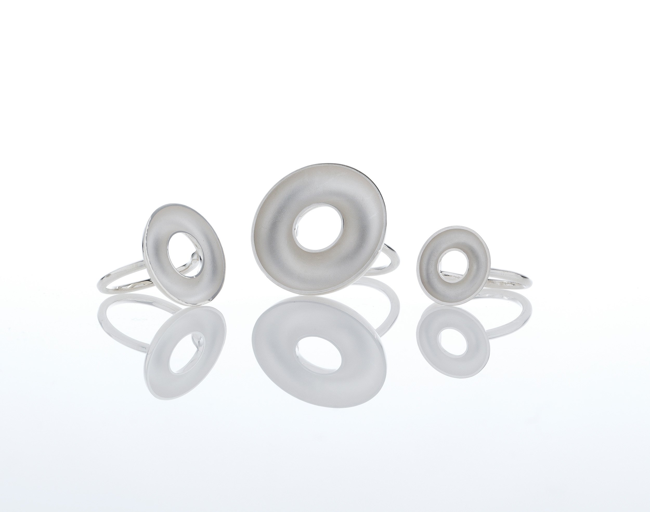 Sterling silver Orbis small, medium and large ring, concave torus form, polished edge and contrasting interior on round band