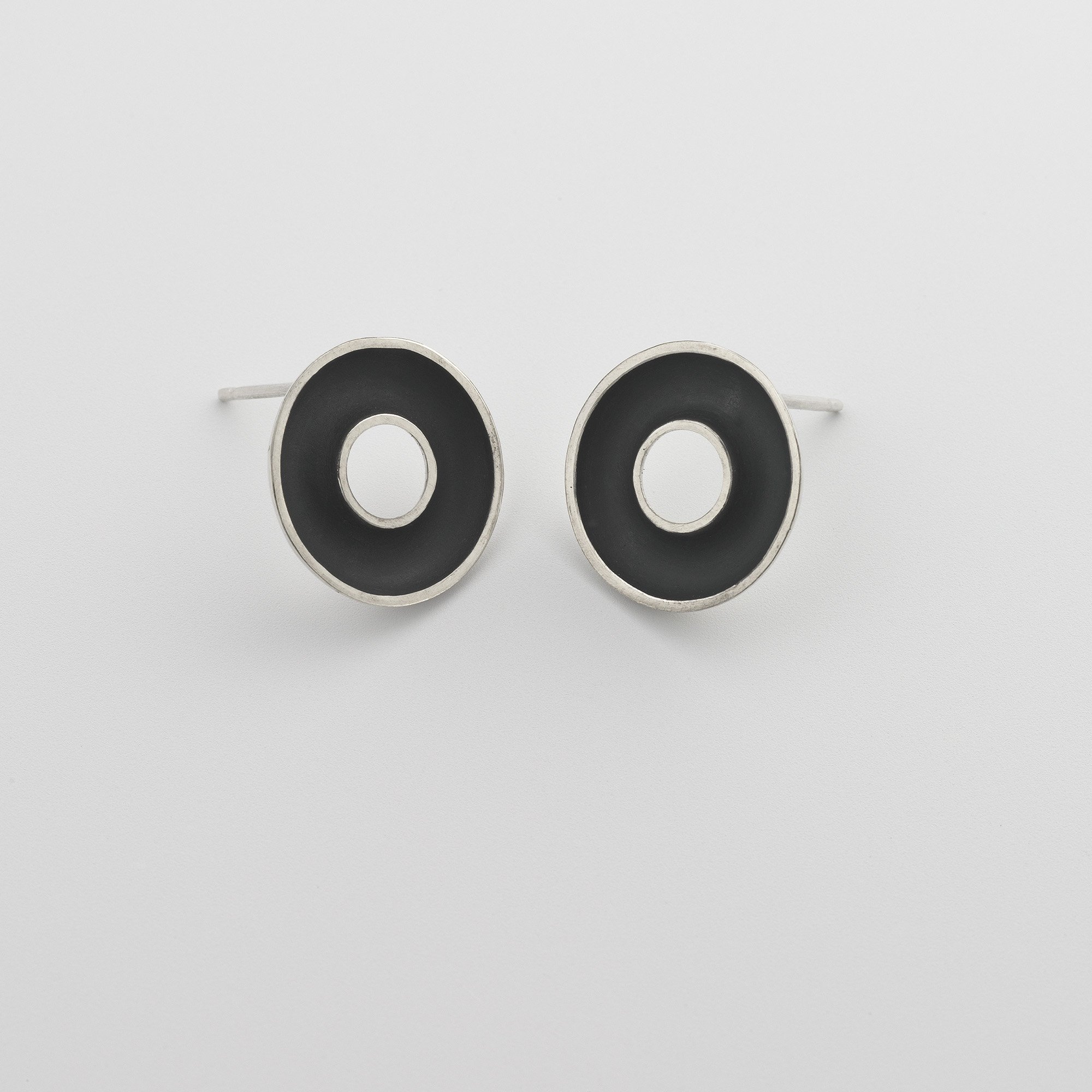 Sterling silver Orbis small stud earrings, circular, concave torus form, polished edge and oxidised interior
