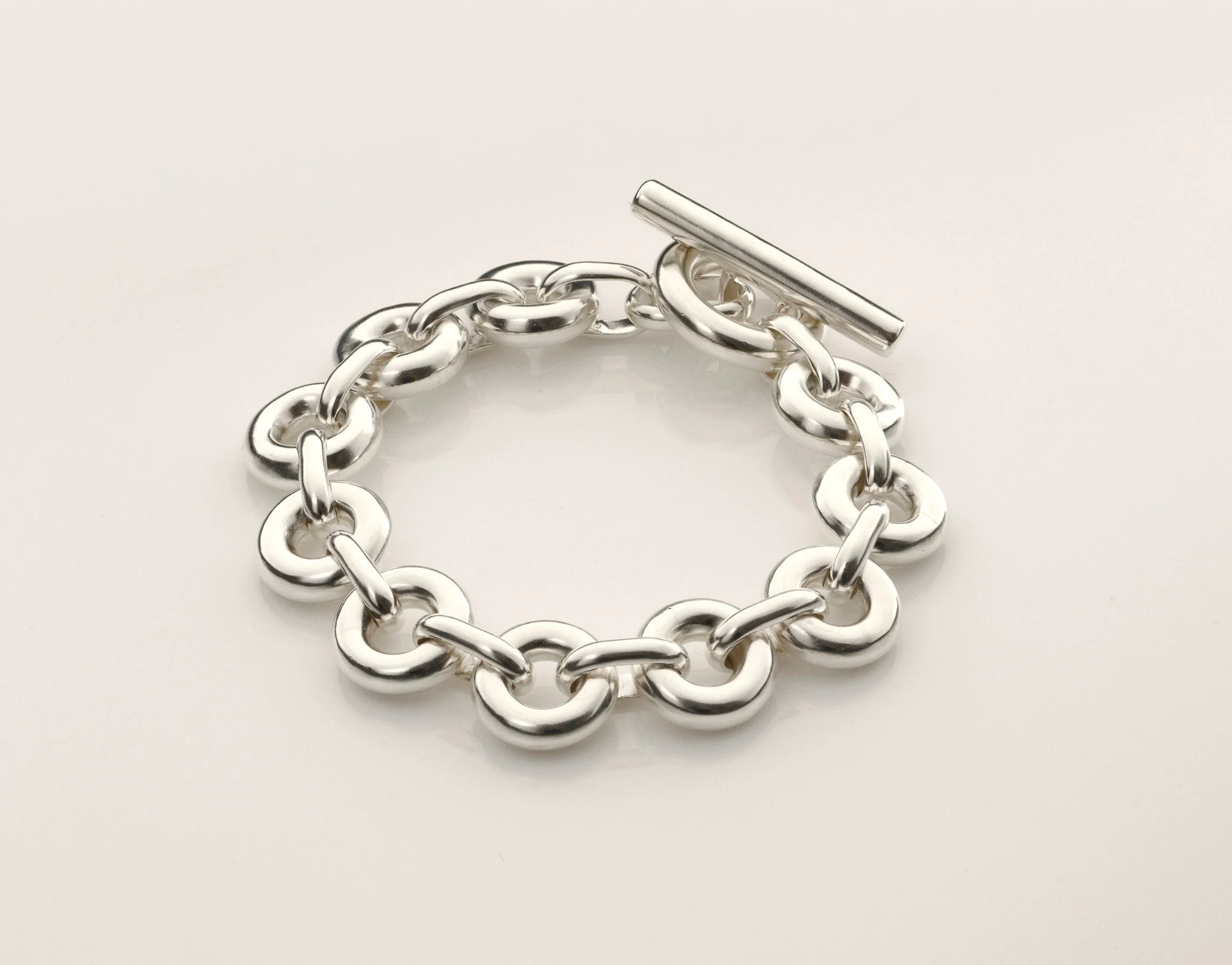 Sterling silver Monad Link bracelet with chunky torus links and T-bar clasp