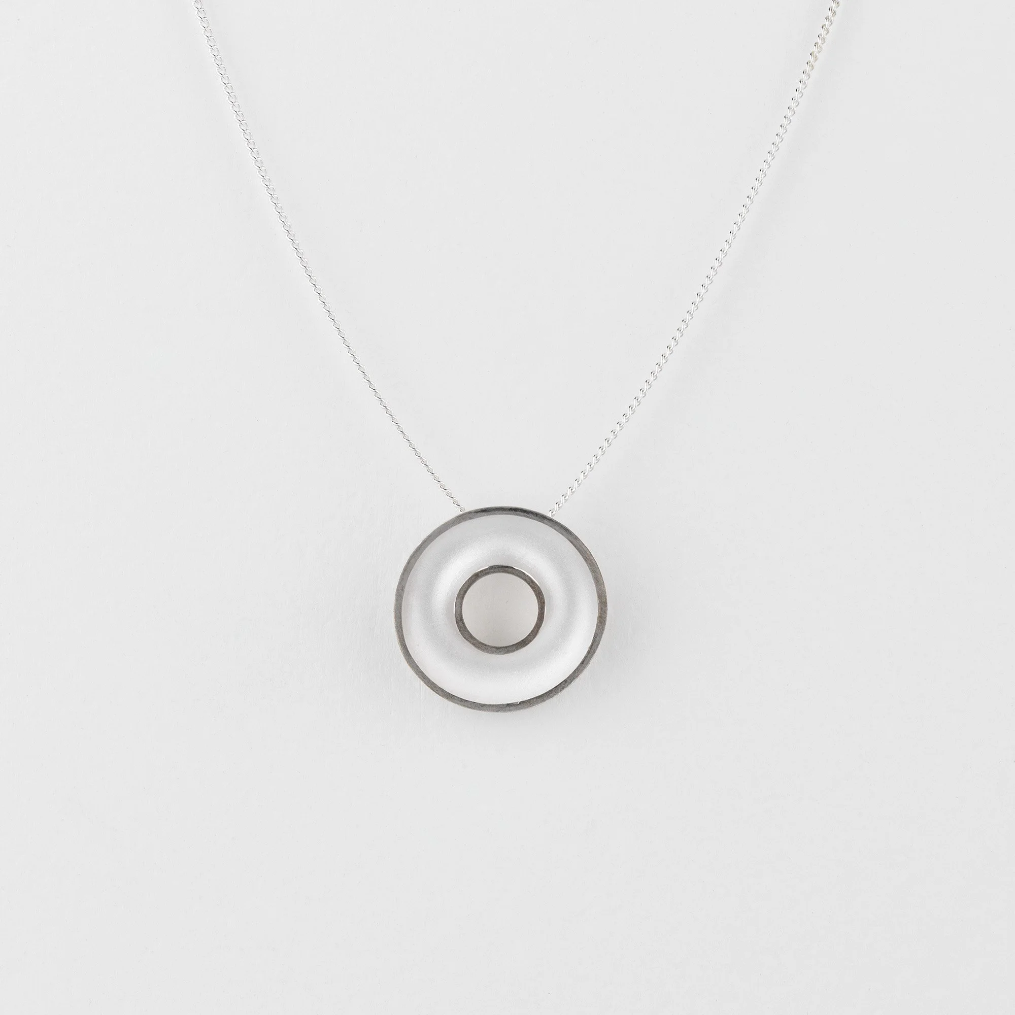 Sterling silver Orbis small necklace, concave torus pendant, polished edge and white interior