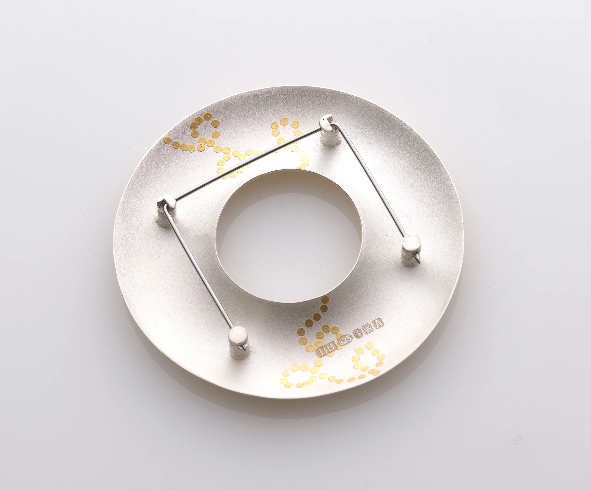 ack of sterling silver Interlace brooch, gold dotted path pattern in 24ct and 18ct green gold