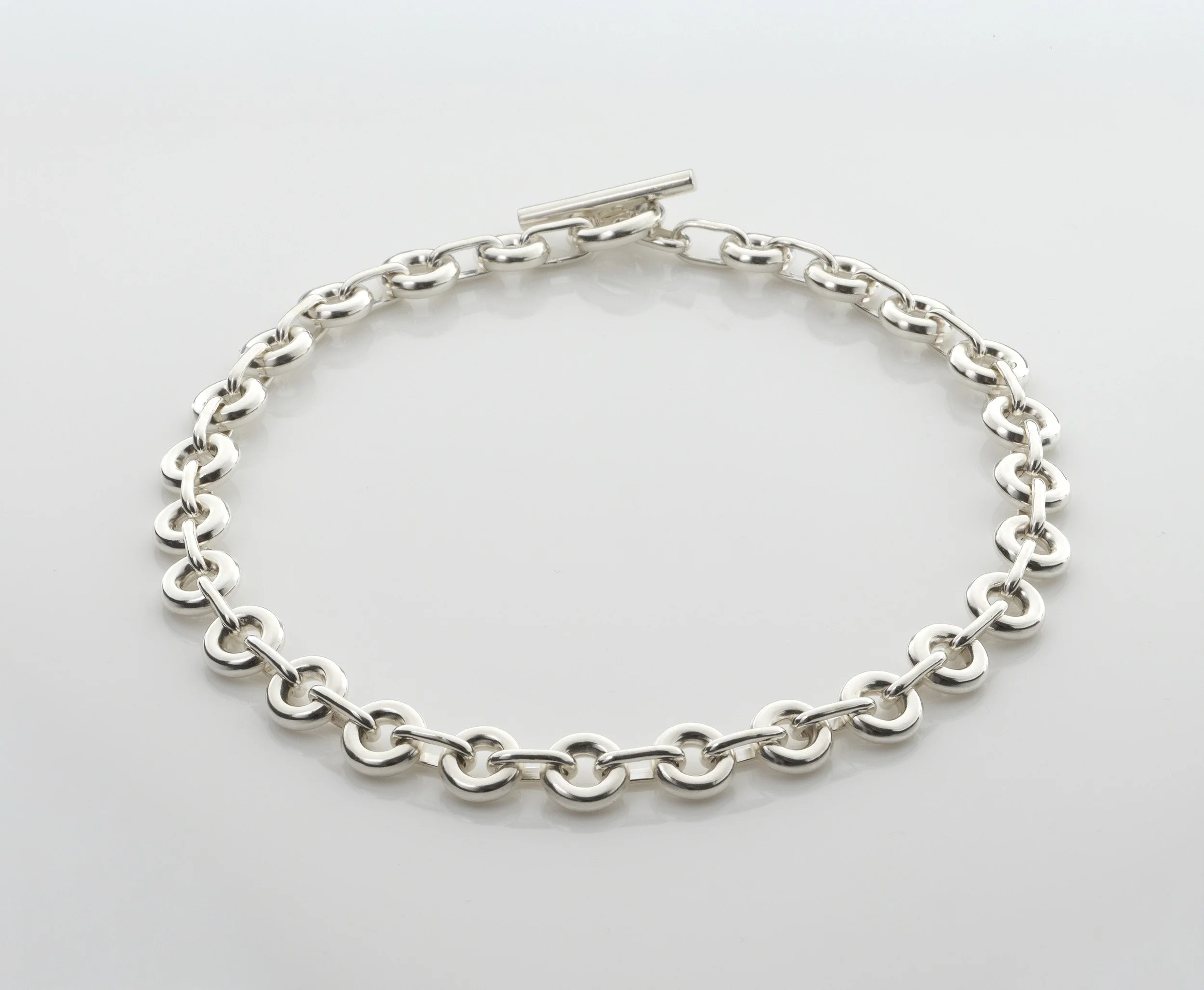 Sterling silver Monad Link necklace, repeated torus links and large T-bar clasp