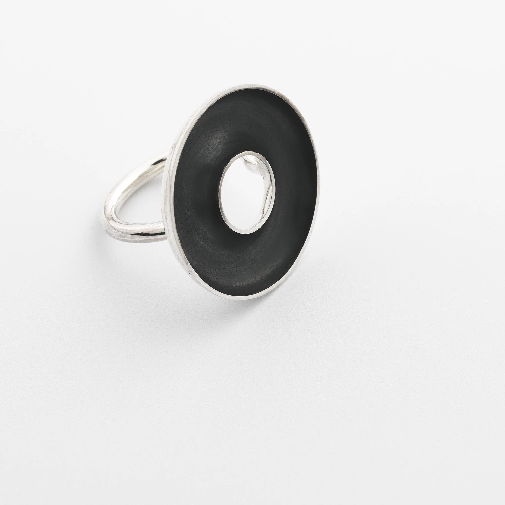 Sterling silver Orbis large ring, concave torus form, polished edge and oxidised interior on round band
