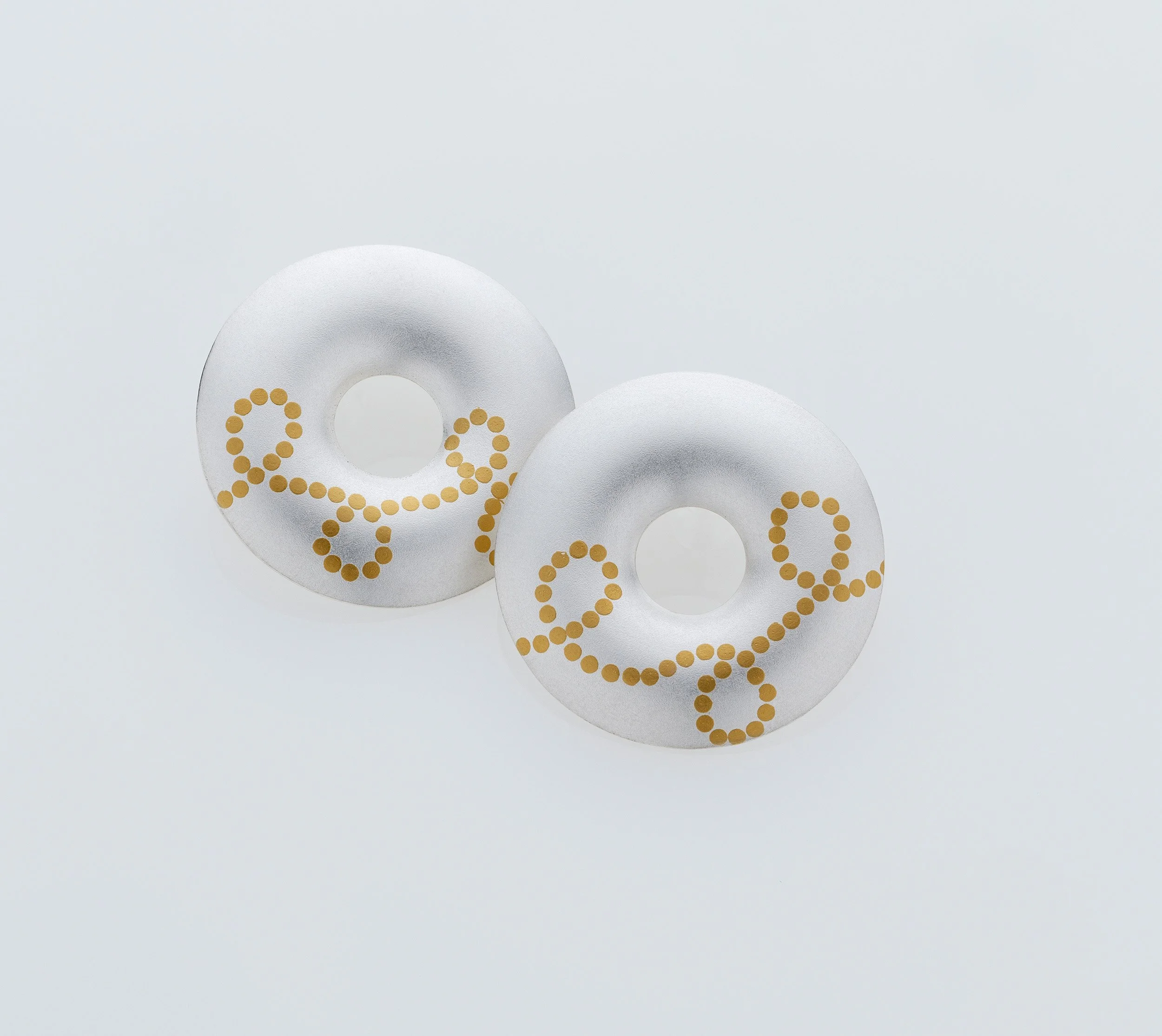 Interlace sterling silver earrings with intricate dotted 24ct gold keum boo pattern, handmade in Glasgow. overlapping view