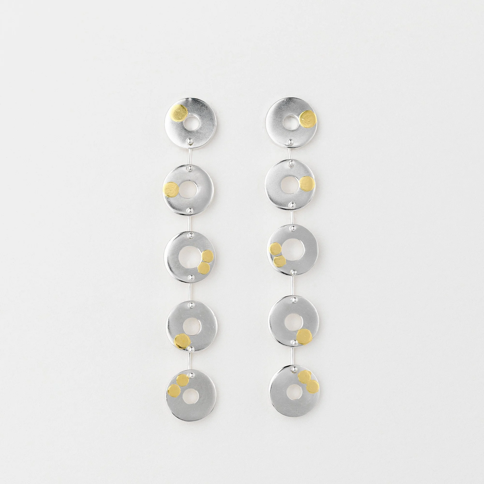 Sterling silver Kairoi statement earrings, linked flat torus circular shapes with 24ct gold dotted detailing
