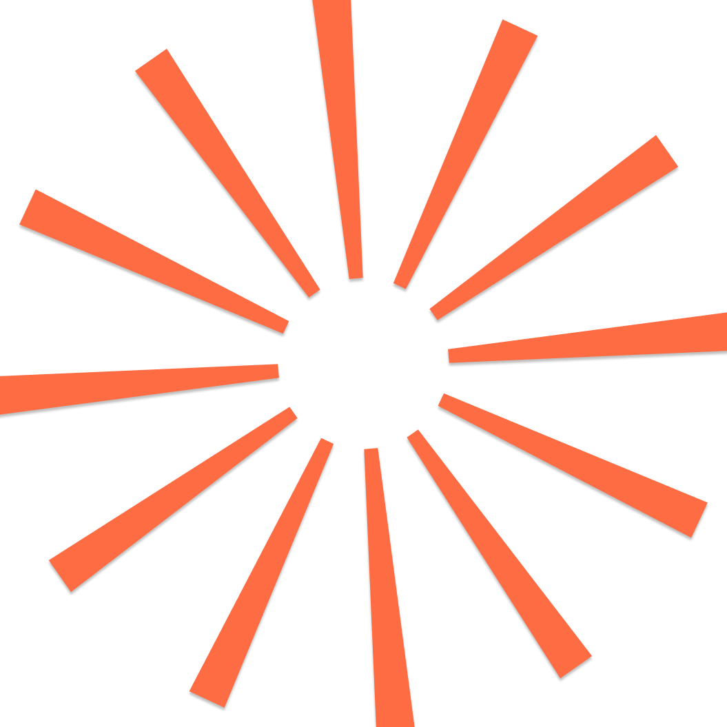 A stylized radial pattern of orange elongated triangles emanating from a central point, resembling a sunburst or explosion effect.