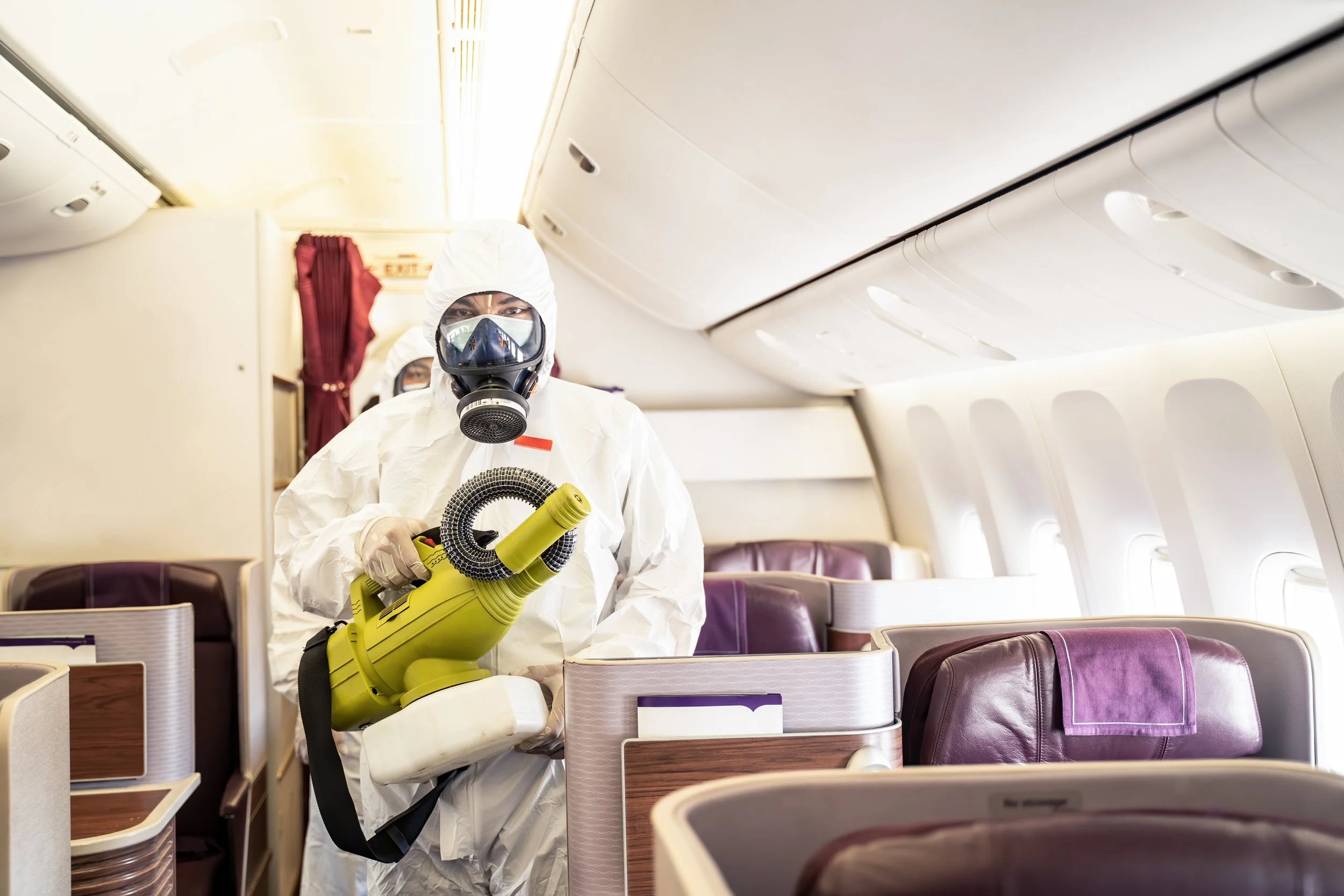 Divine Aviation Detailing technician performing cabin cleaning on private jet interior, Central Florida