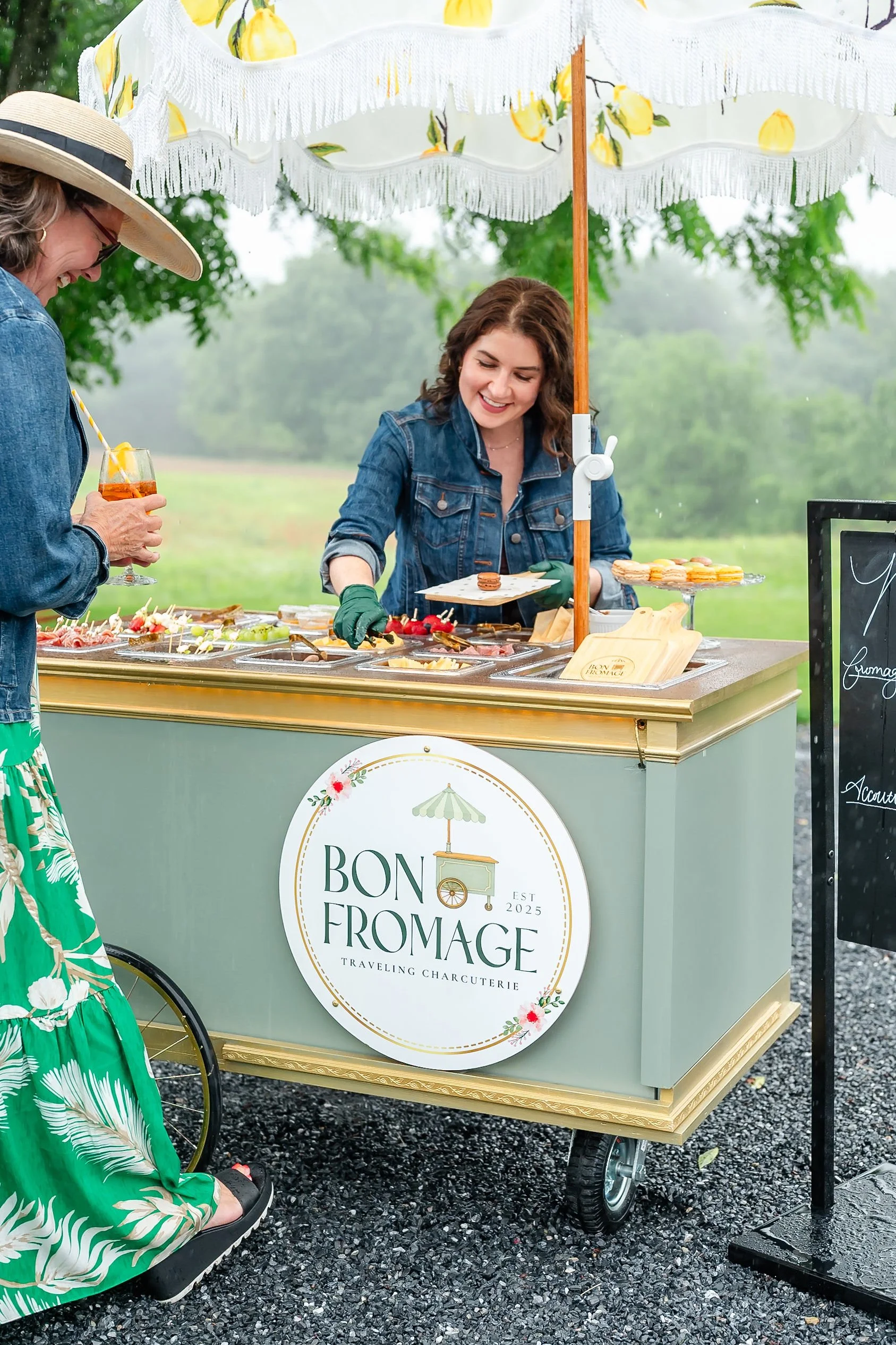 Mobile charcuterie cart setup at private event