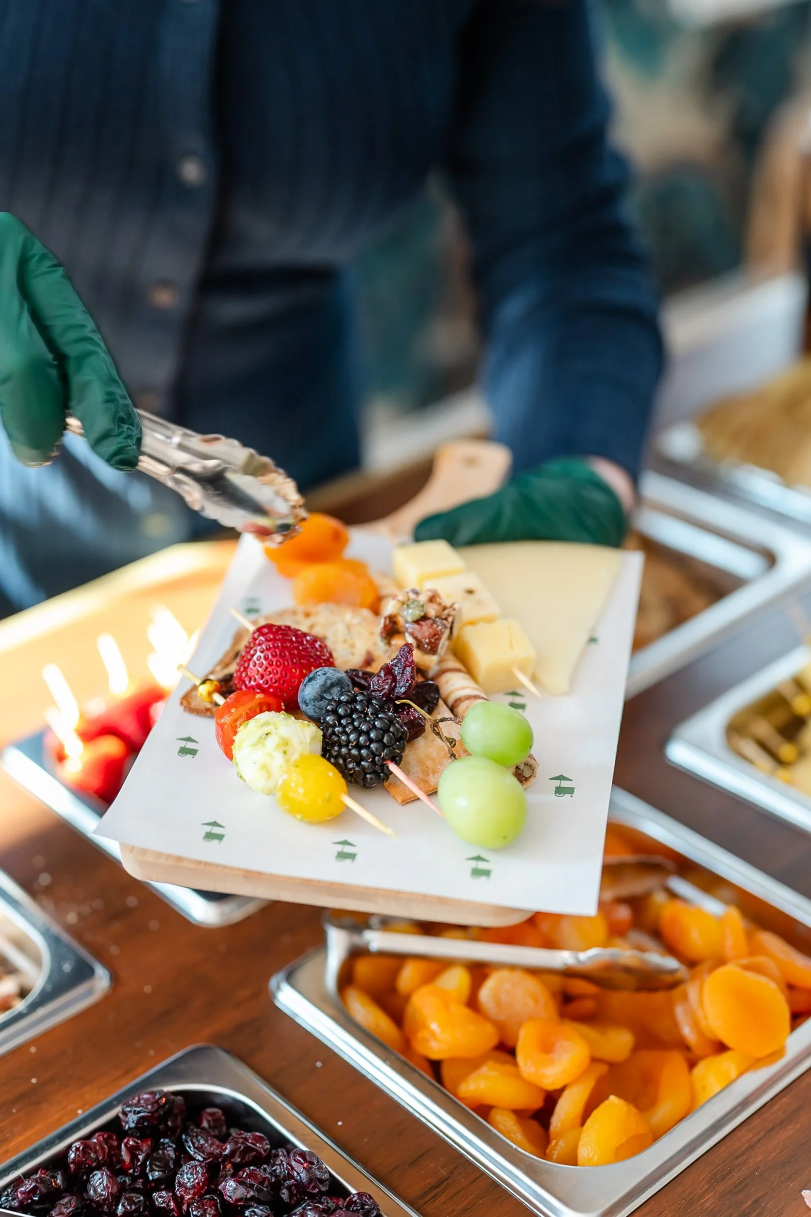 Detailed charcuterie display with crackers, meats, and cheeses