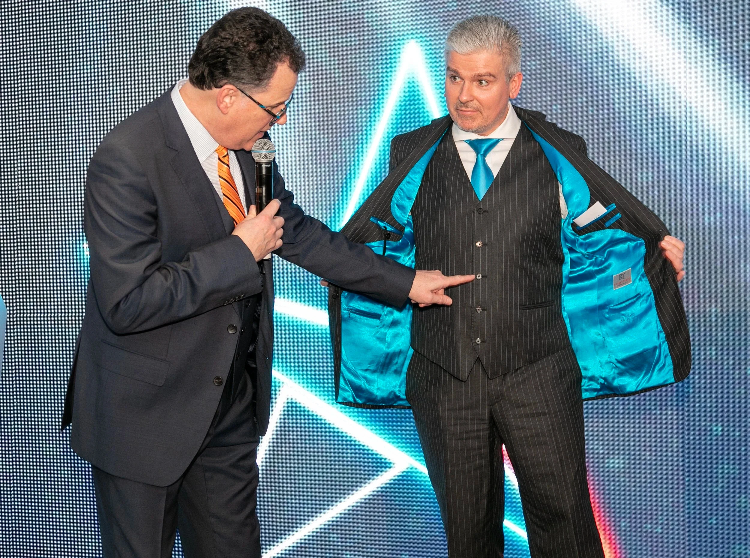 David Bell - awards event, wearing blue suite
