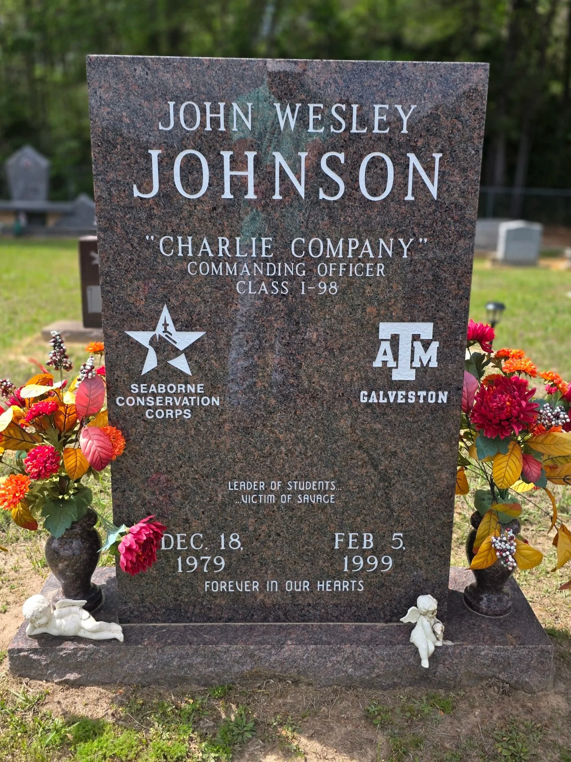 The gravestone features the logos of Seaborne Conservation Corps and Texas A&M University Galveston.