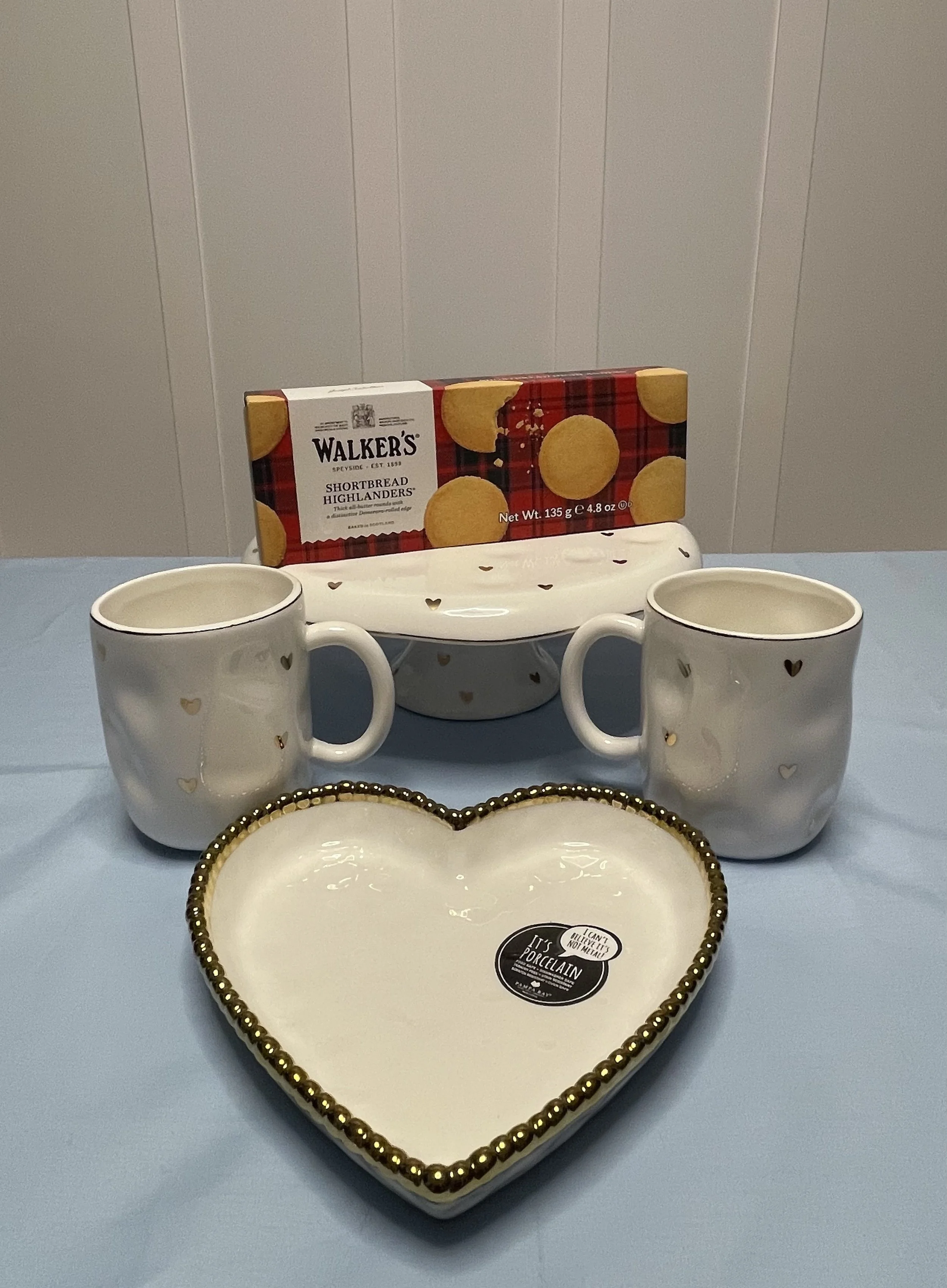 Pampa Bay Cake Stand, heart dish, and Coffee Mug Set, estimated value $125