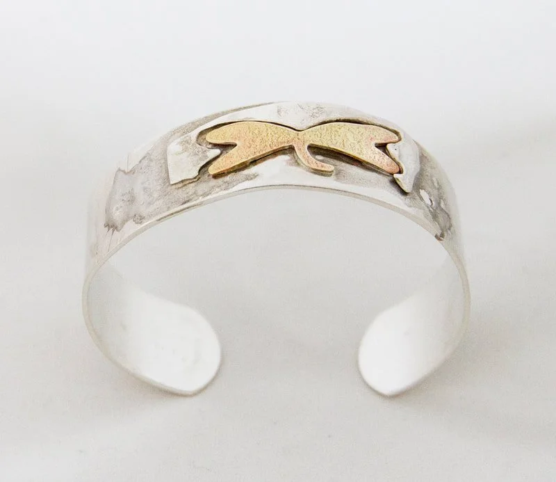 Materials: Sterling Silver Cuff,  Bronze Dragonfly.  Availability "Private Collection."