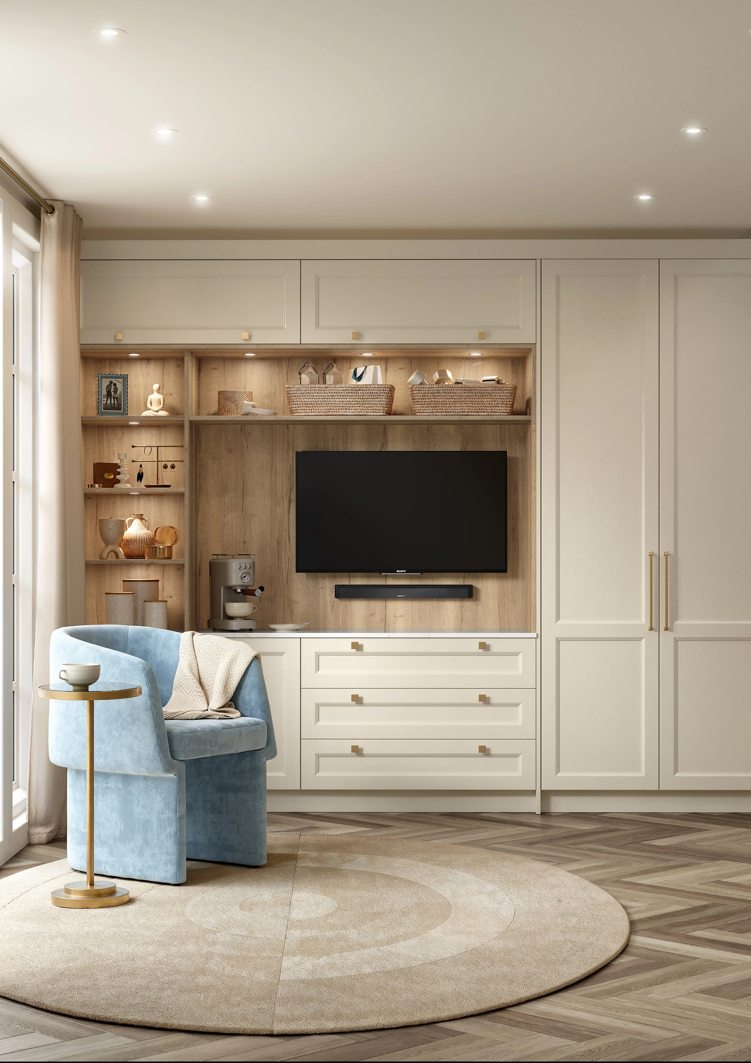 Living room with a blue armchair, round side table, cream-colored area rug, built-in wooden shelf with decor, TV, and cabinetry, hardwood floor, sunlight through window, modern fixtures.