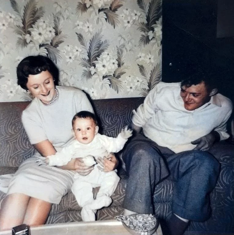 Mom and Dad. Looks of love. Little guy.