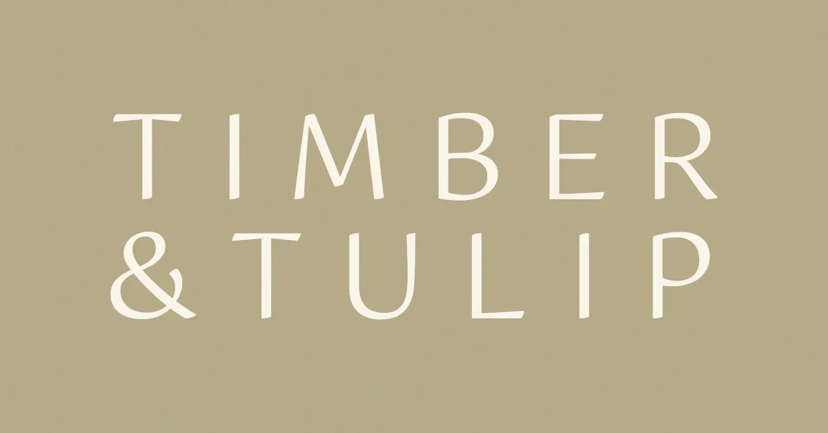 Text reading 'TIMBER & TULIP' on a beige background.