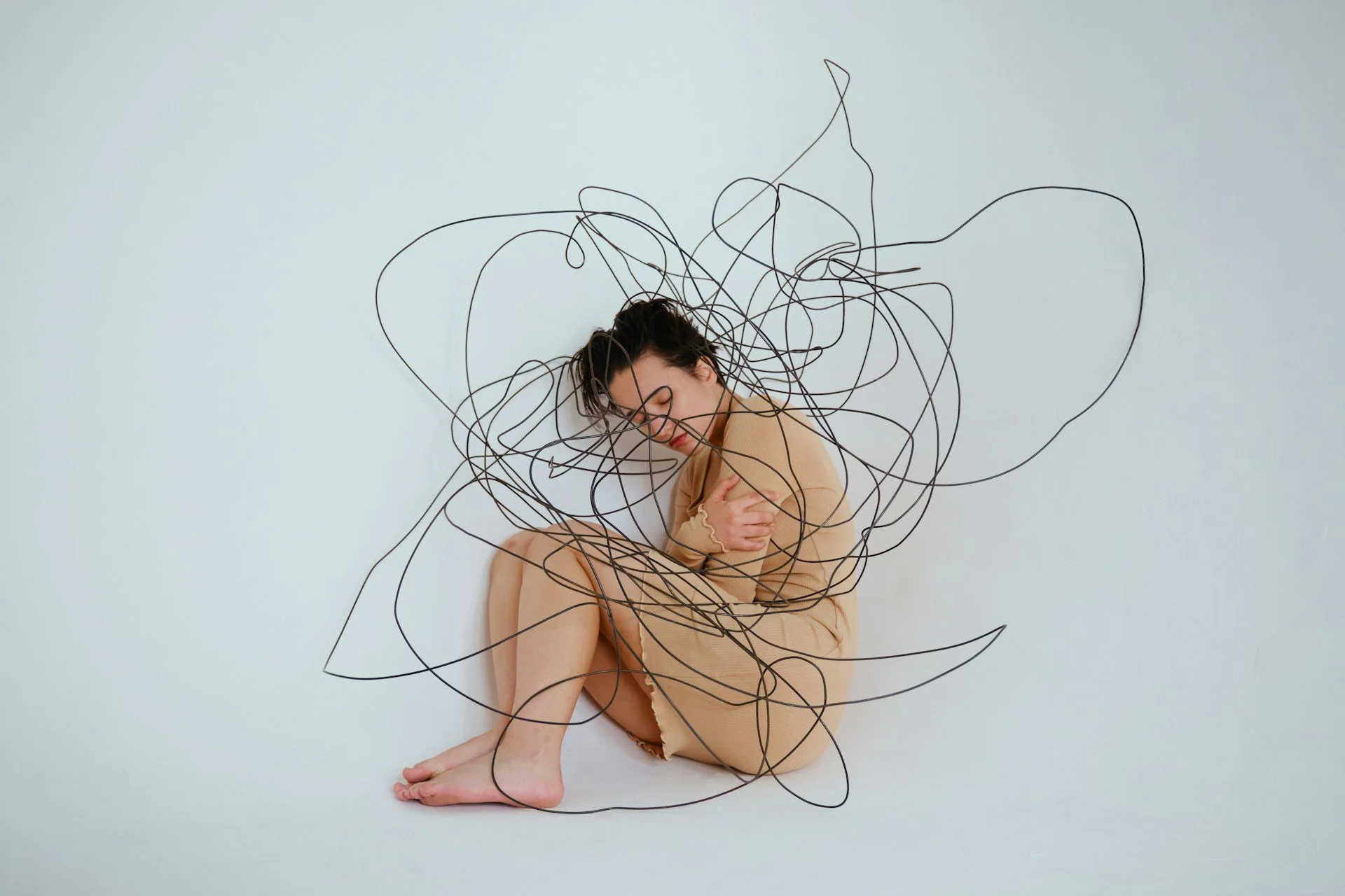 A women with black abstract lines all over