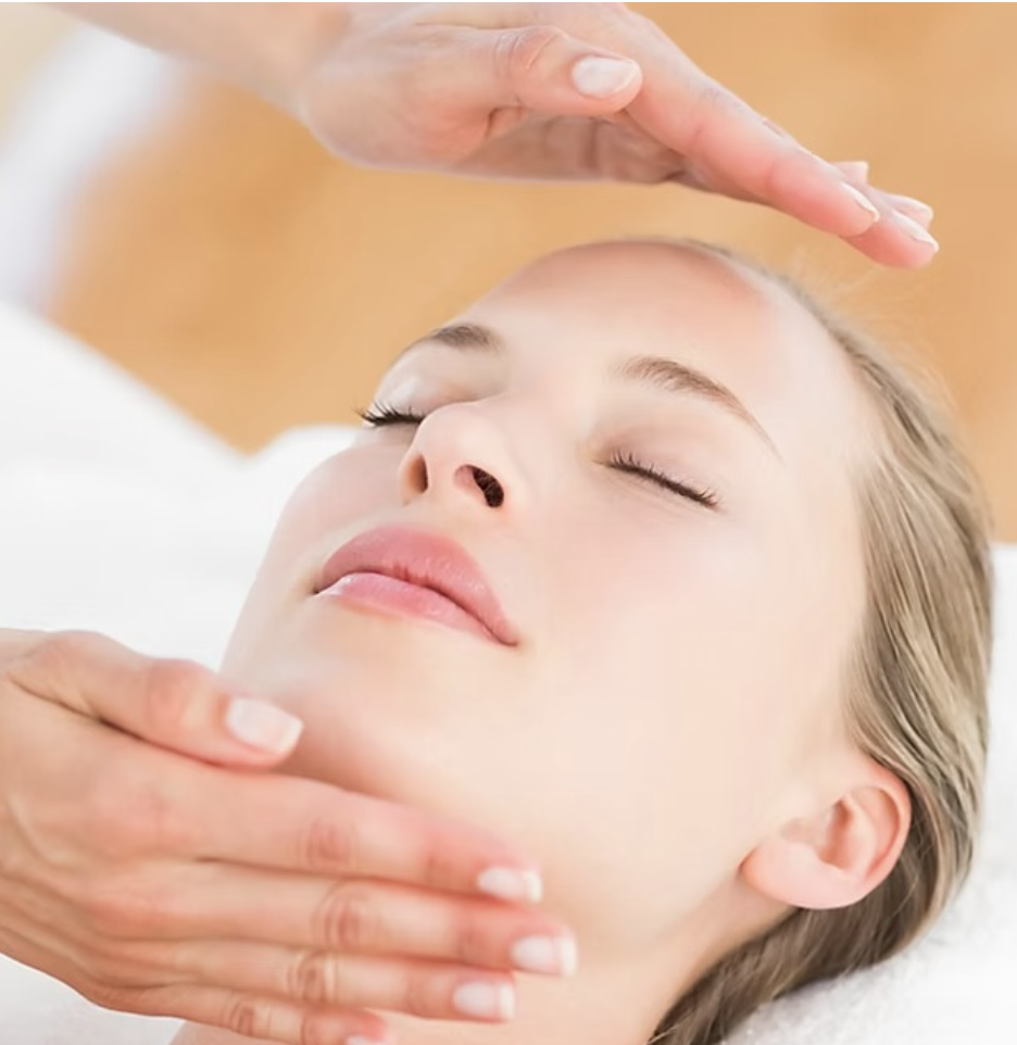 A client receiving the restorative benefits of Reiki energy healing at Catherine Goodman Wellness For Life in Sausalito, CA.