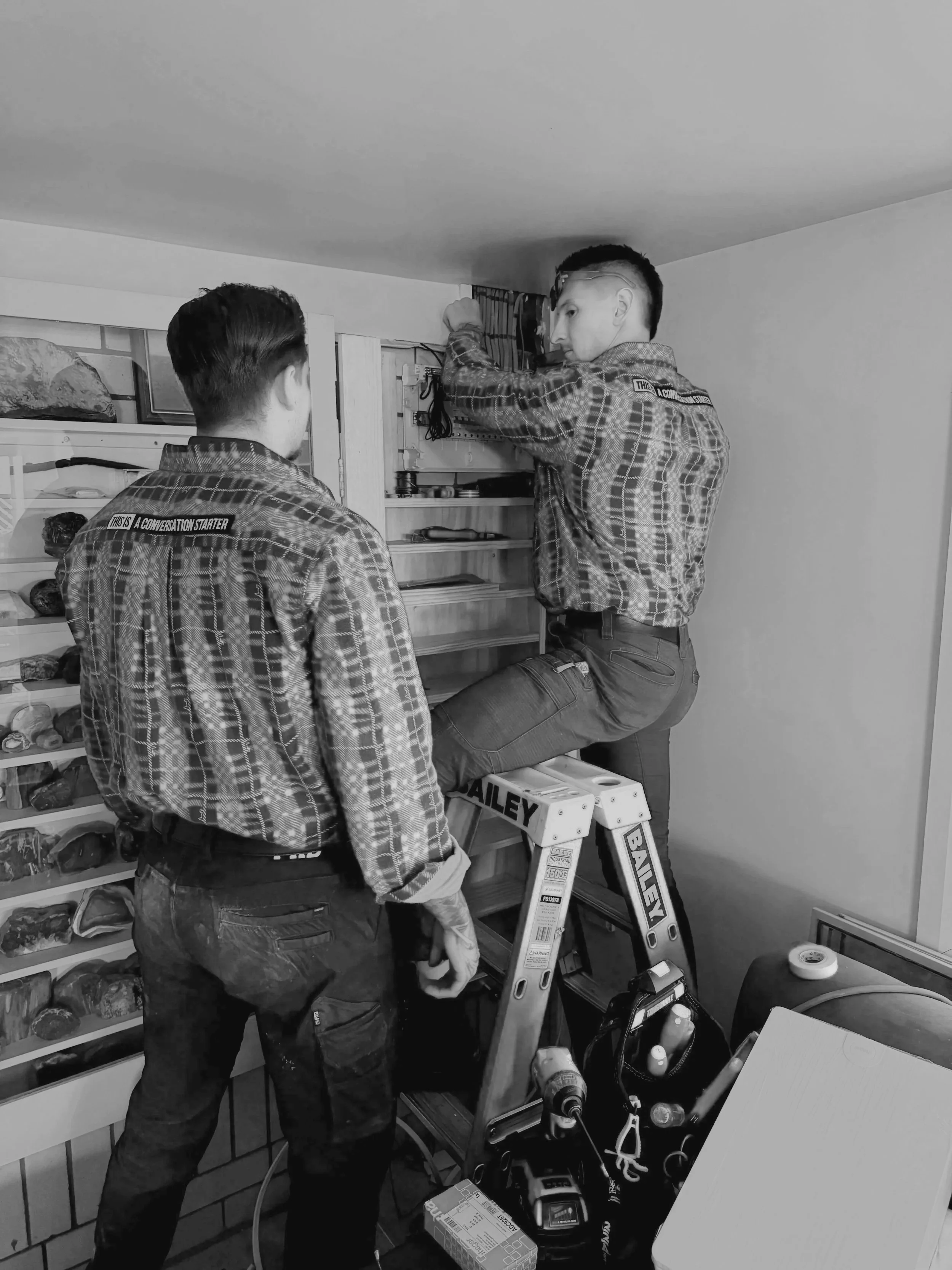 licensed electrician Brisbane installing lighting and electrical systems in modern home