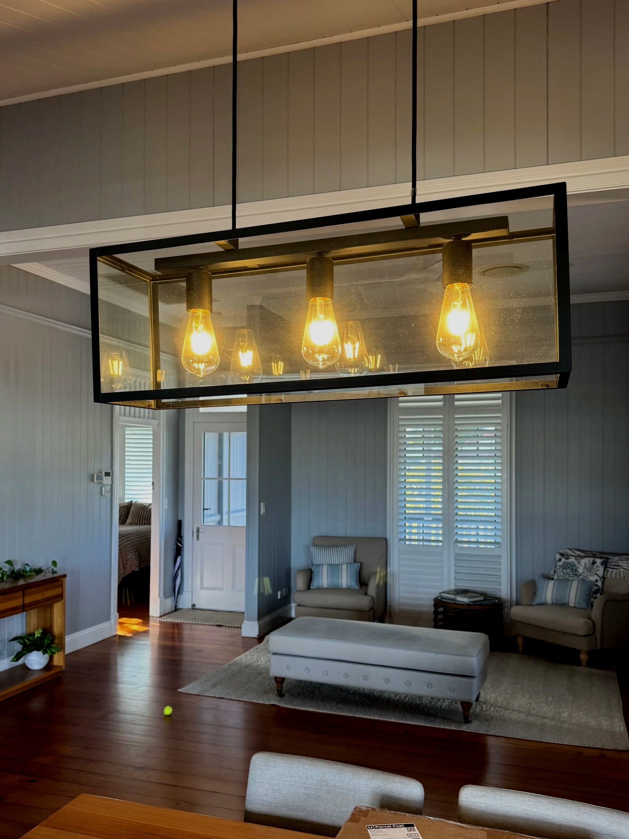 Modern pendant lighting installation by electrician in Brisbane home interior lighting upgrade