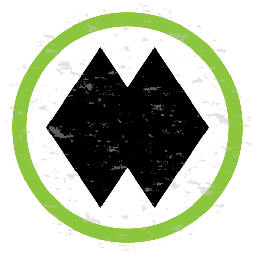 A circular logo with a green border and a black diamond shape with points facing up, down, left, and right.