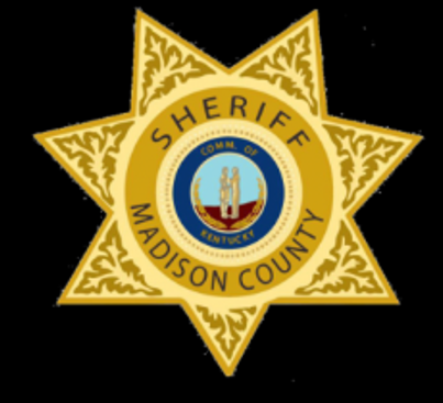 Sheriffs badge on a black background