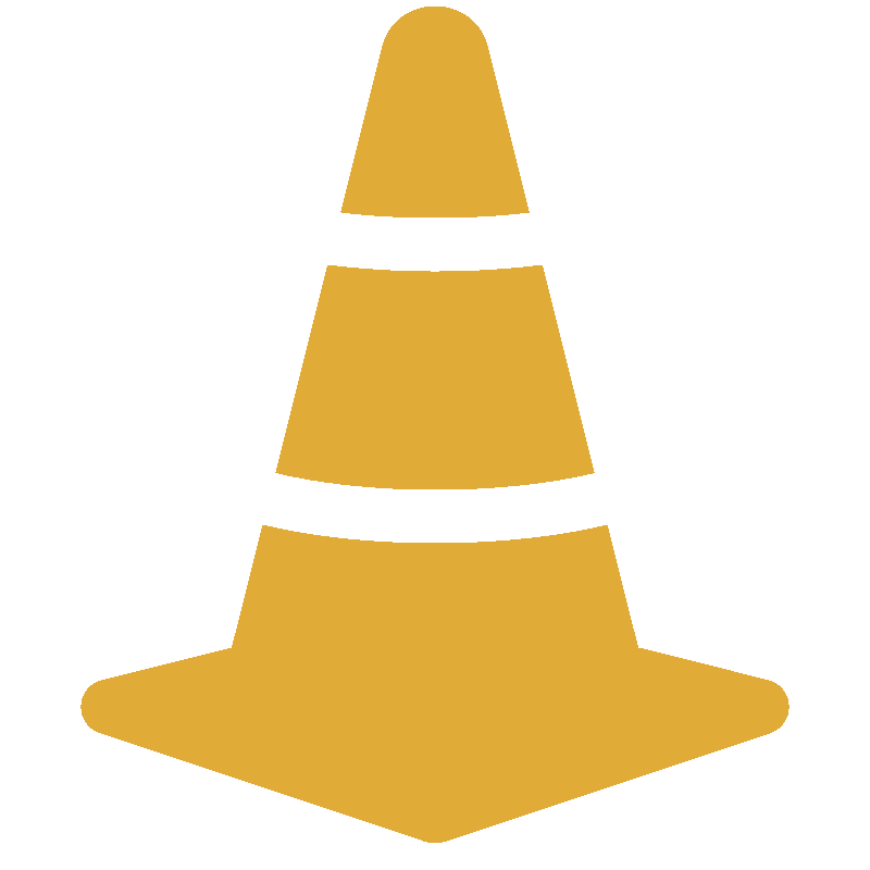 A yellow traffic cone with black stripes on a black background.