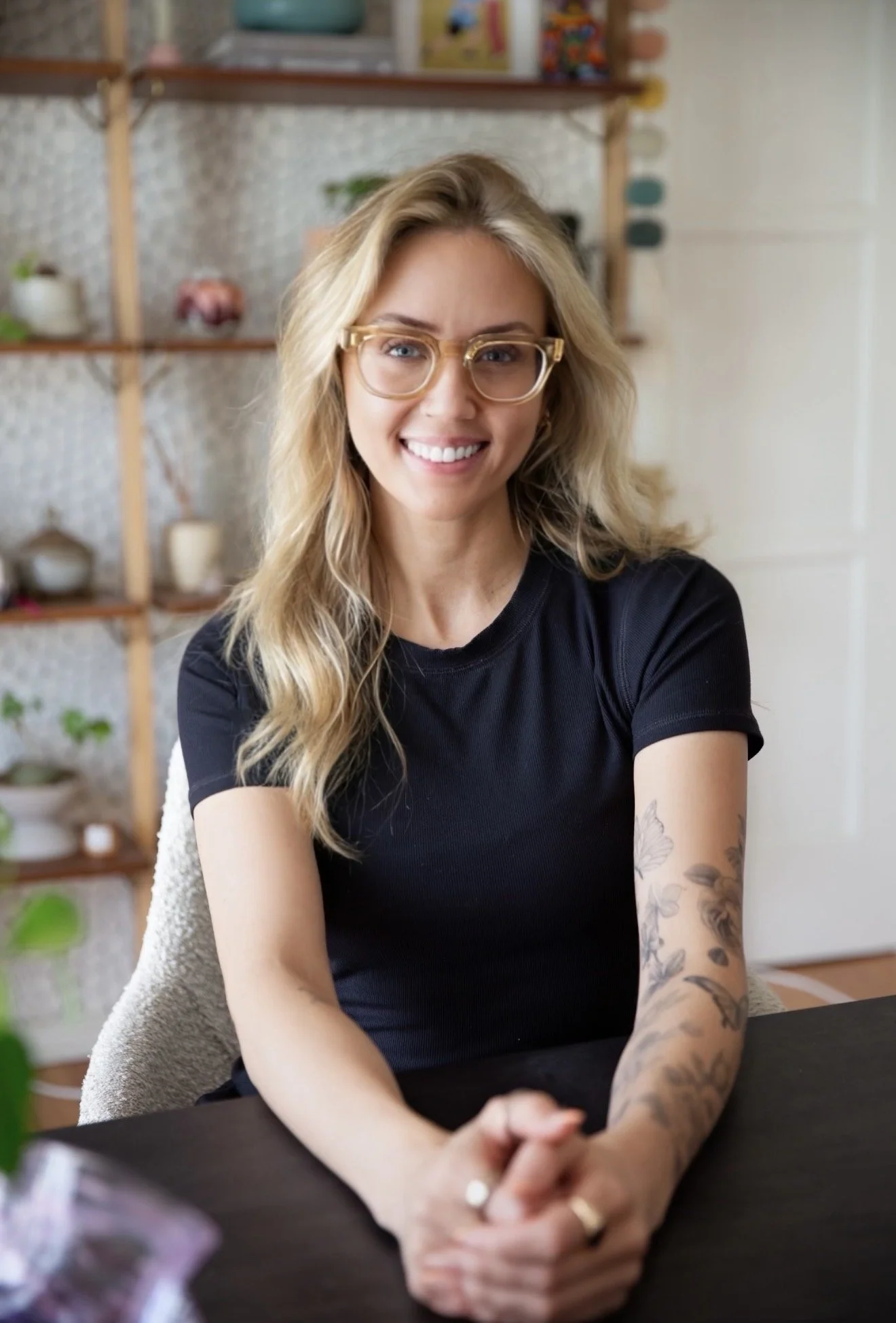 blond woman with glasses with calm calming presence smiling, therapist in person in office los angeles pasadena california