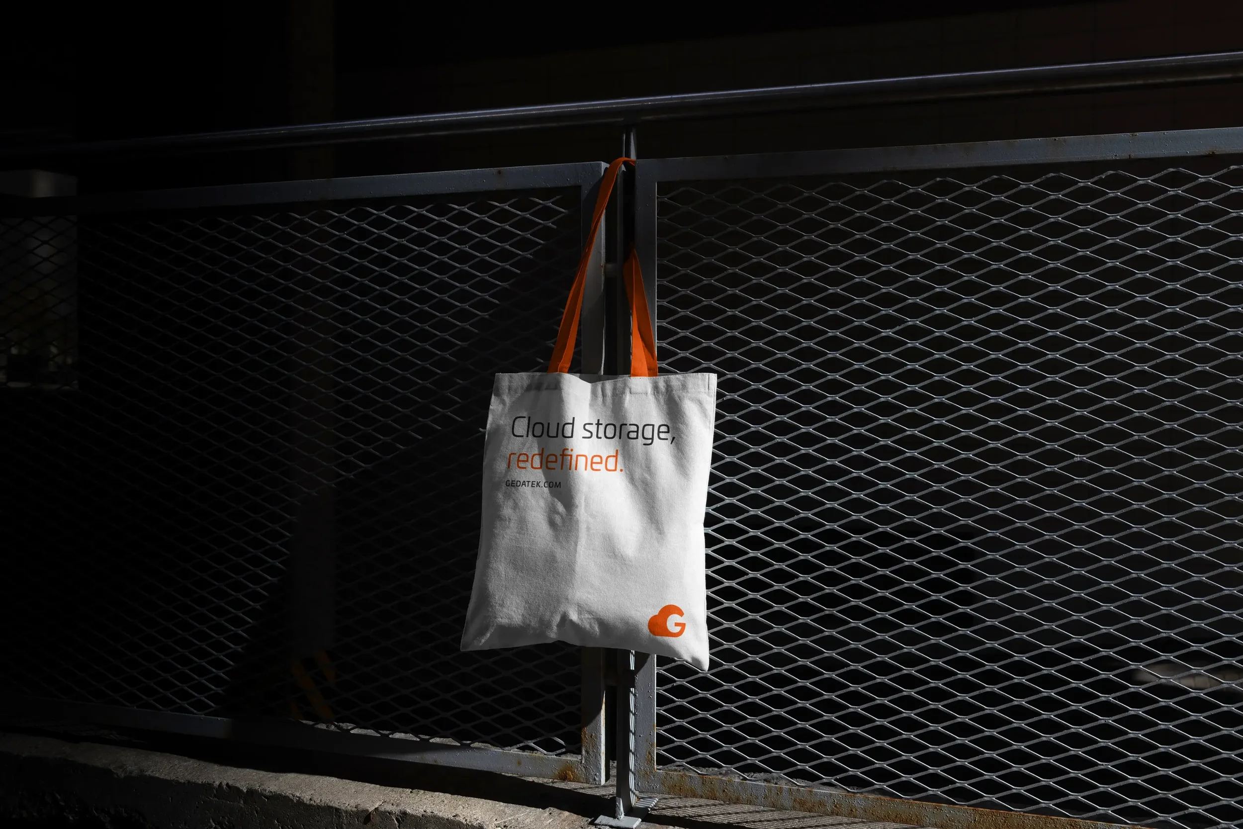 Branded canvas tote bag merchandise design for a tech company