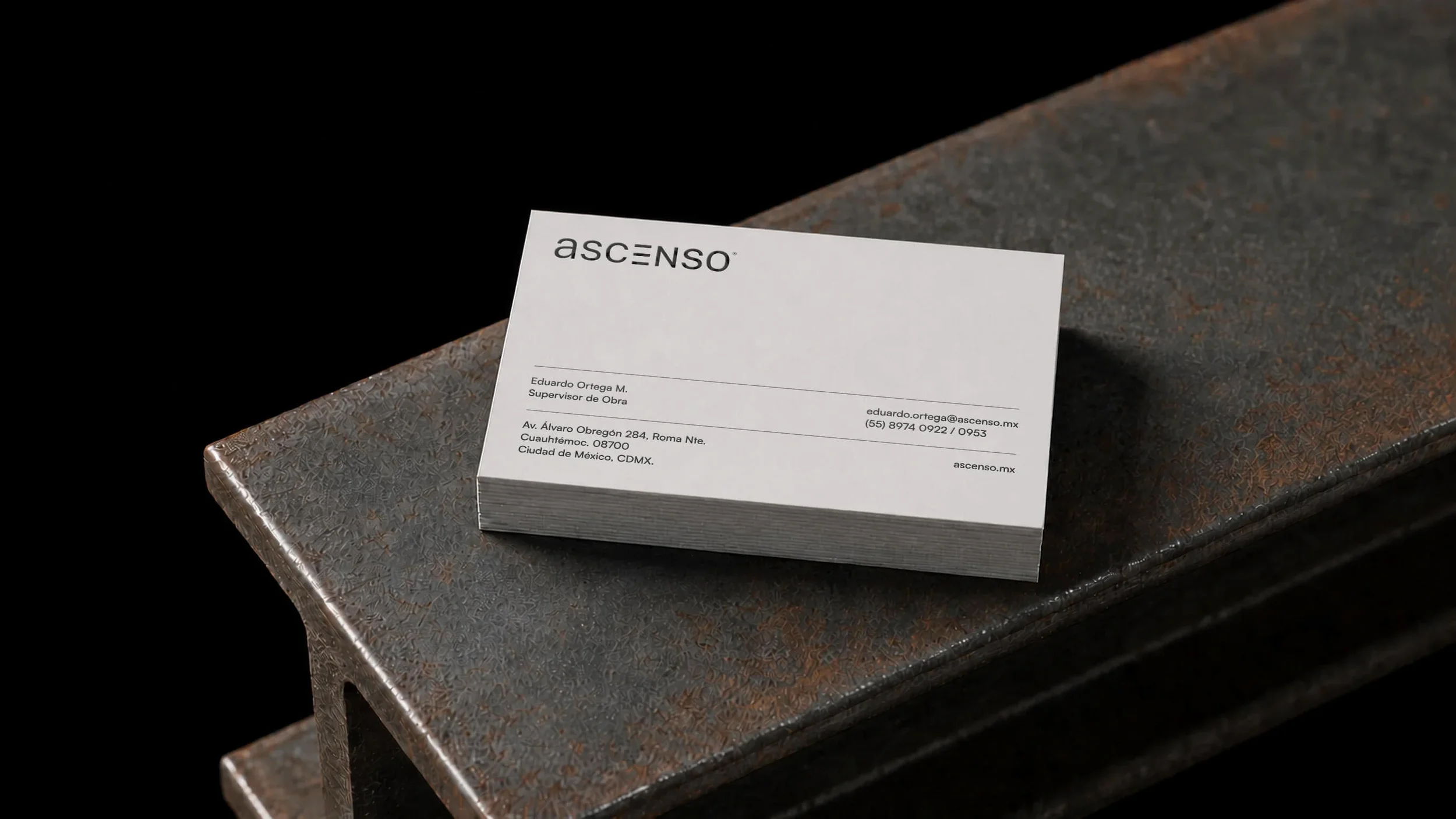 Minimal business card design for a construction company branding project.